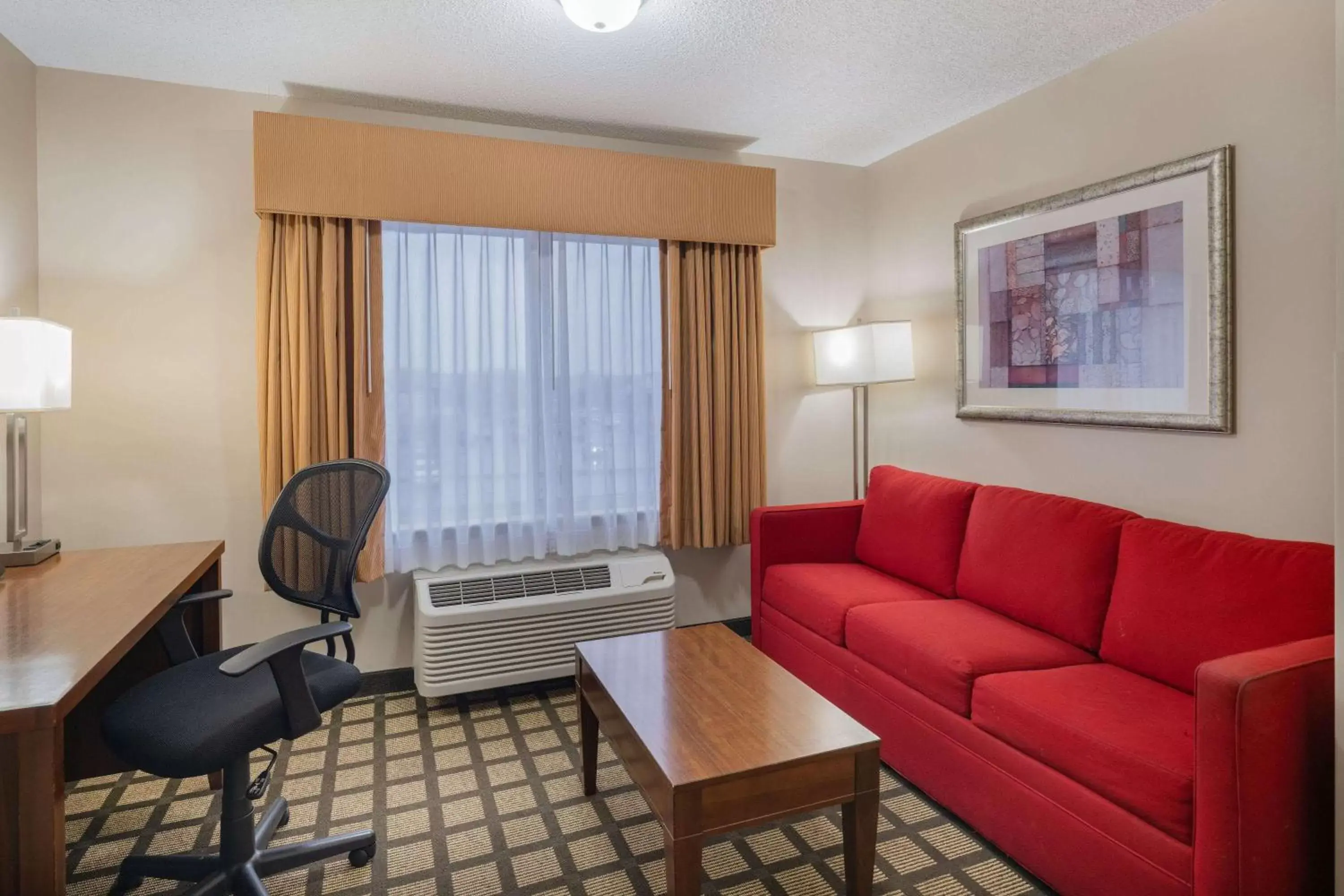 Bed, Seating Area in Baymont by Wyndham Gurnee