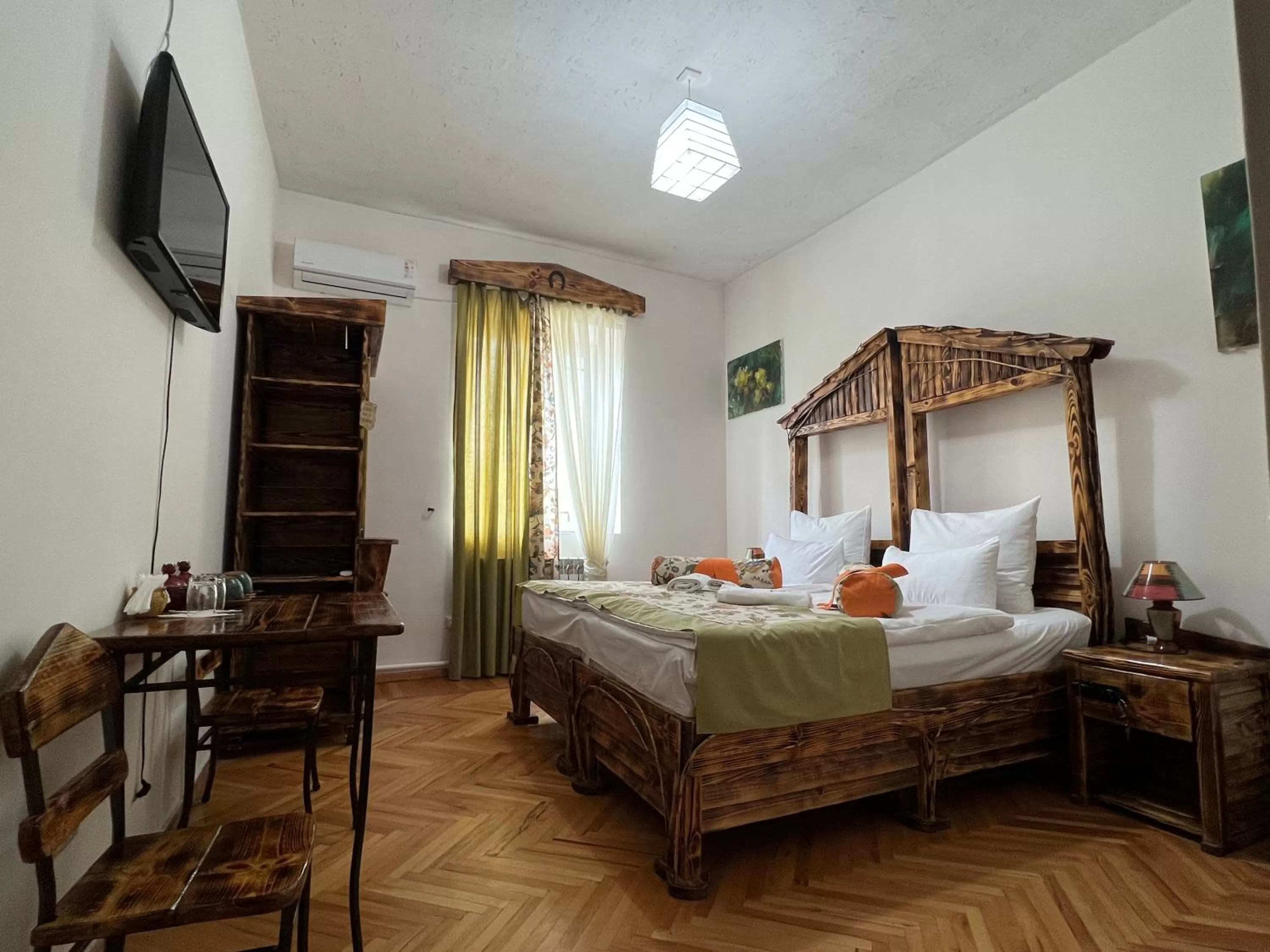 Bed in Machanents Art Hotel