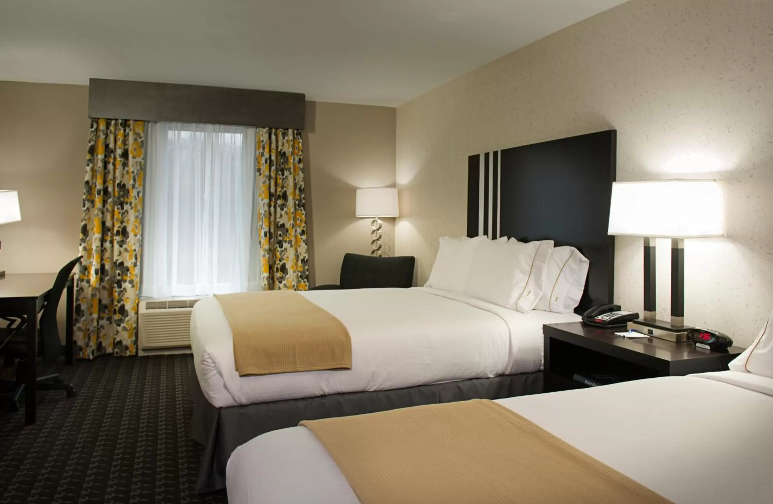 Bed in Holiday Inn Express and Suites Madison Central, an IHG Hotel
