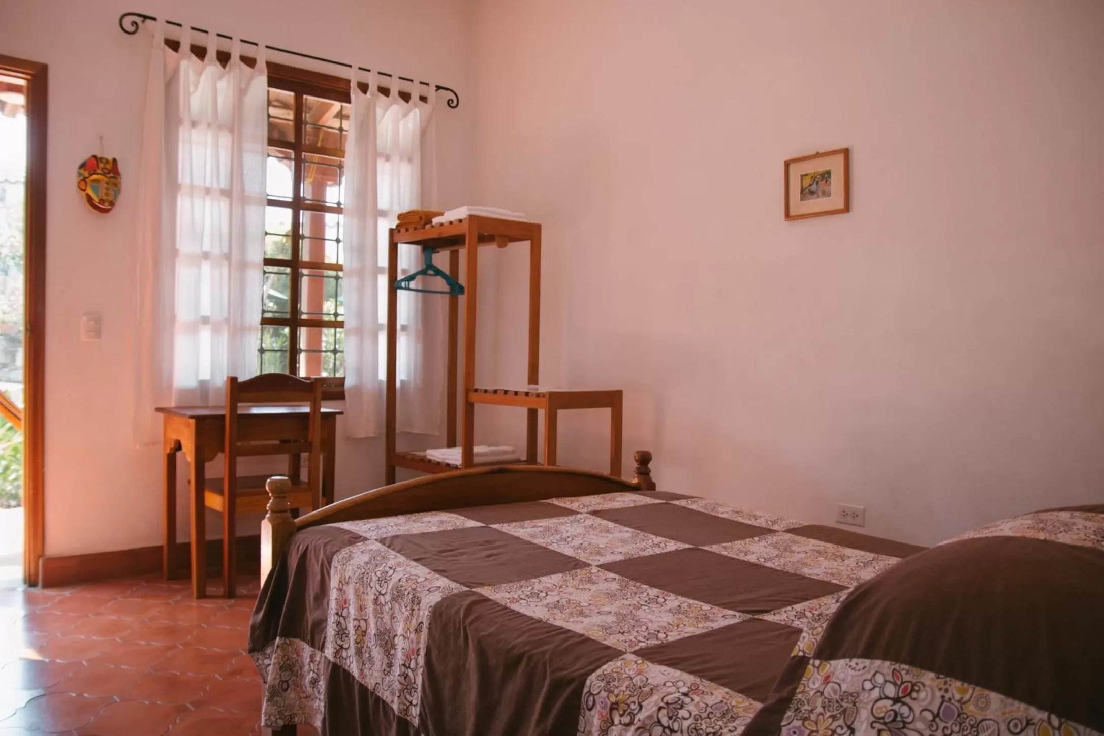 Bed in La Casa de Cafe Bed and Breakfast