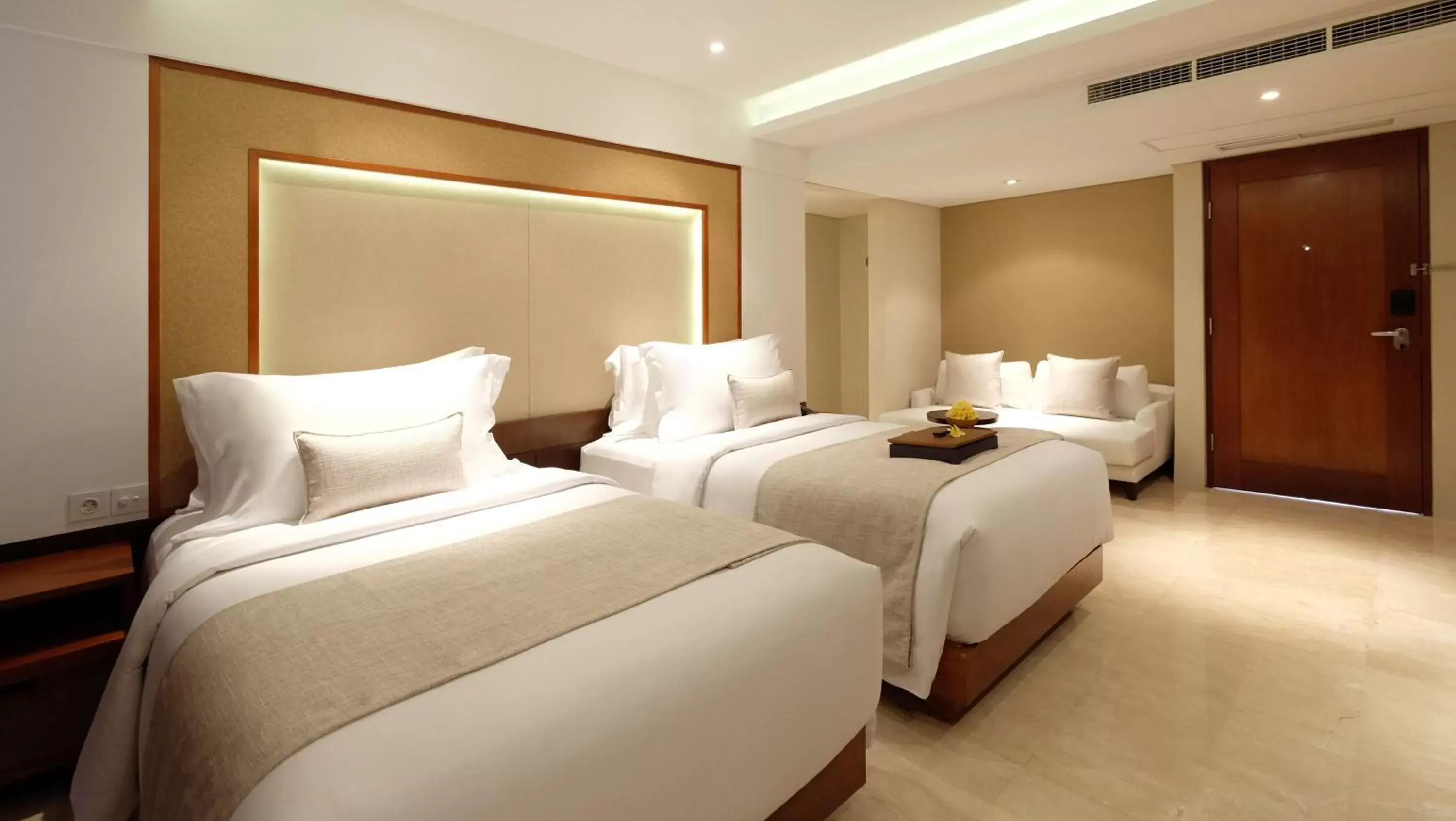 Bed in The Bandha Hotel & Suites