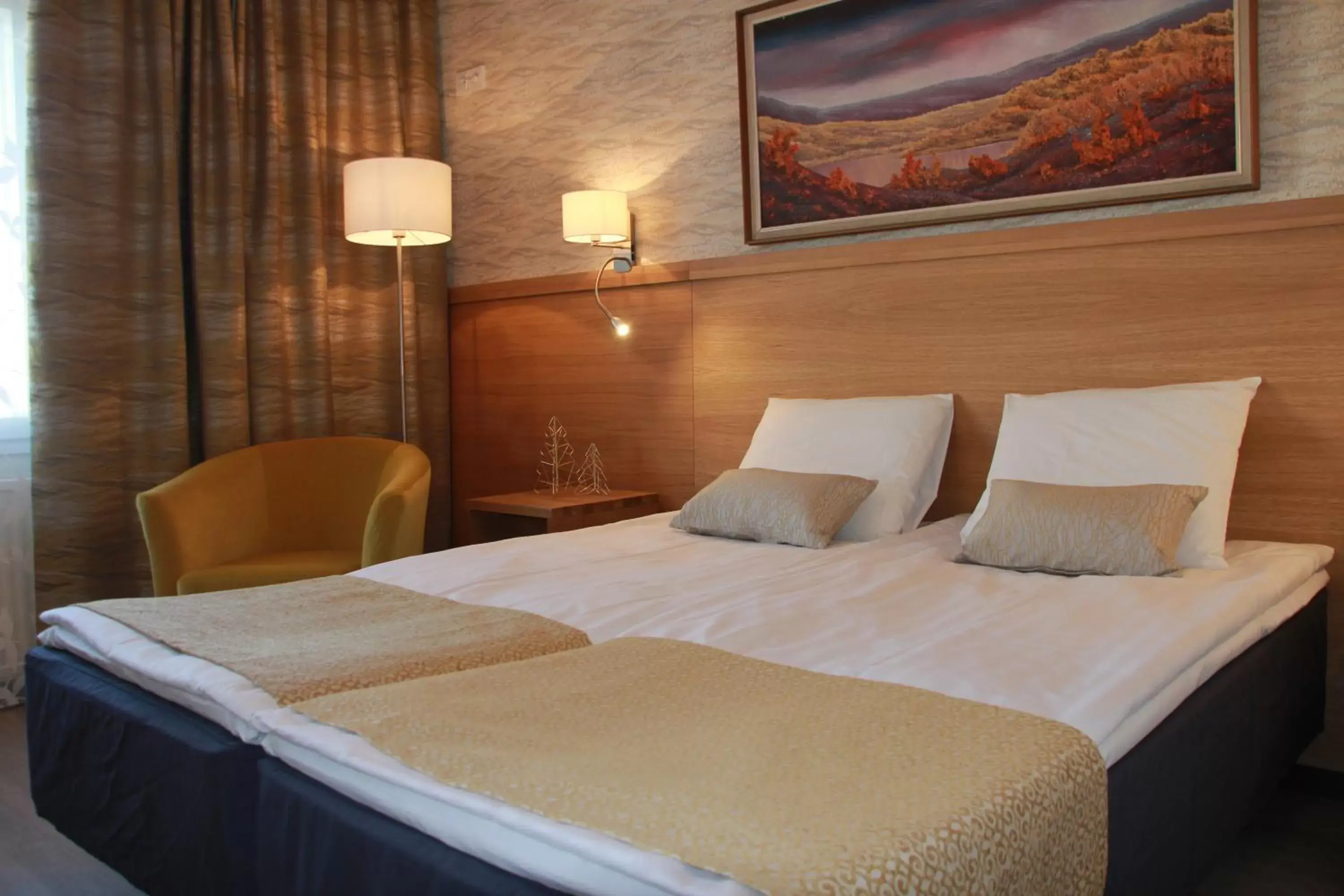 Bed in Hotel Aakenus