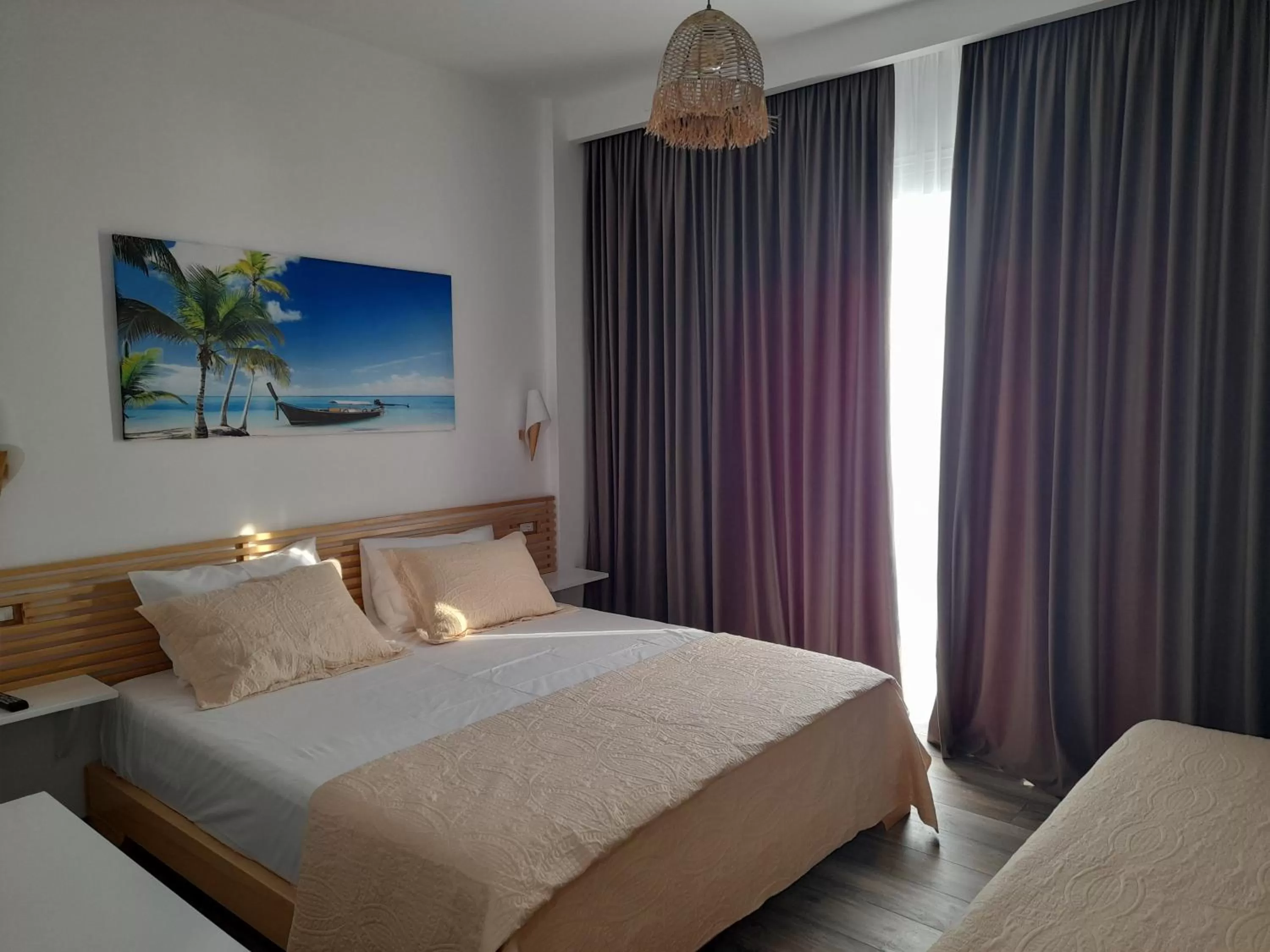 Bed in Anxhelos Hotel