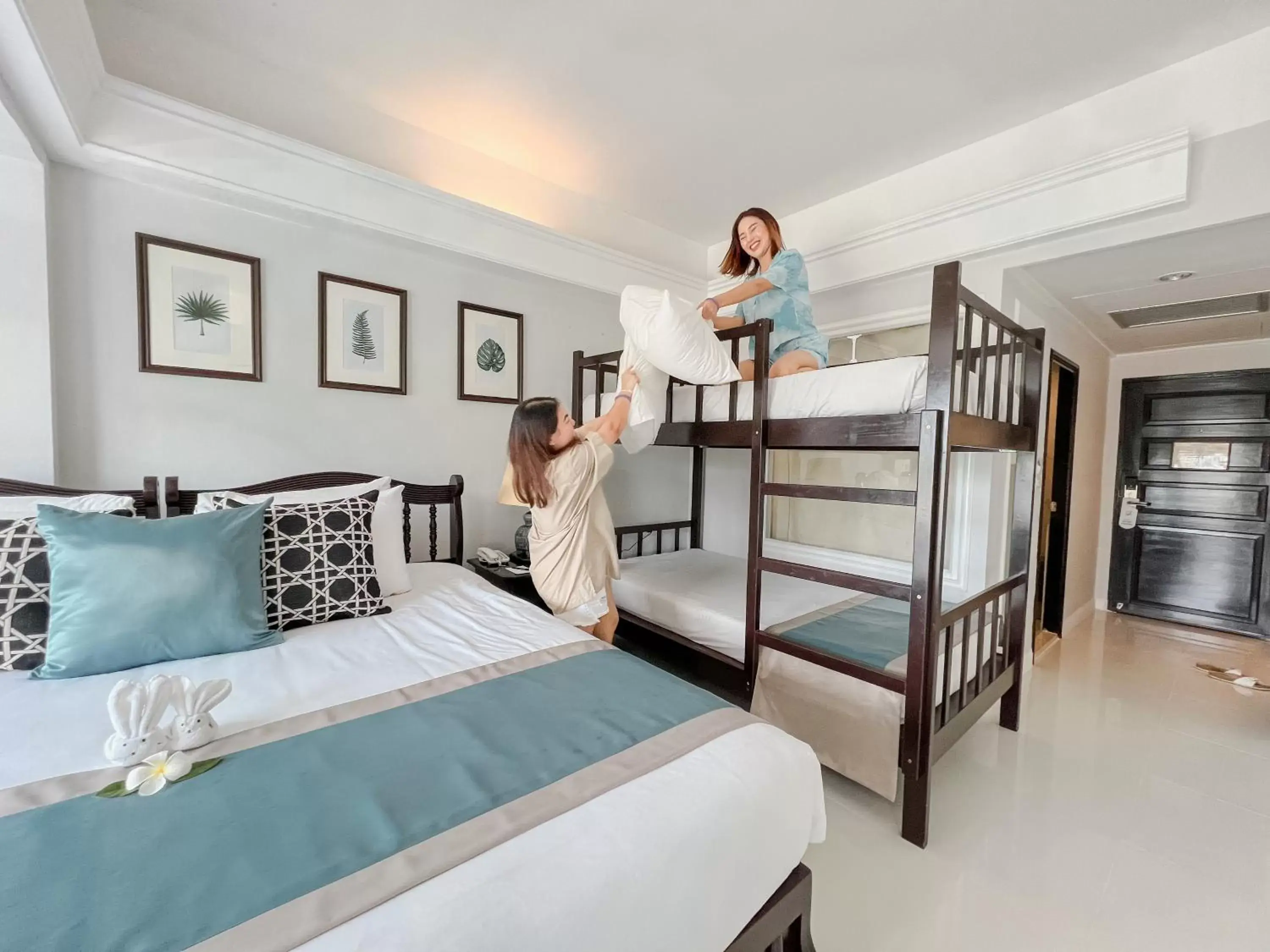 Bed in Thavorn Palm Beach Resort Phuket - SHA Extra Plus