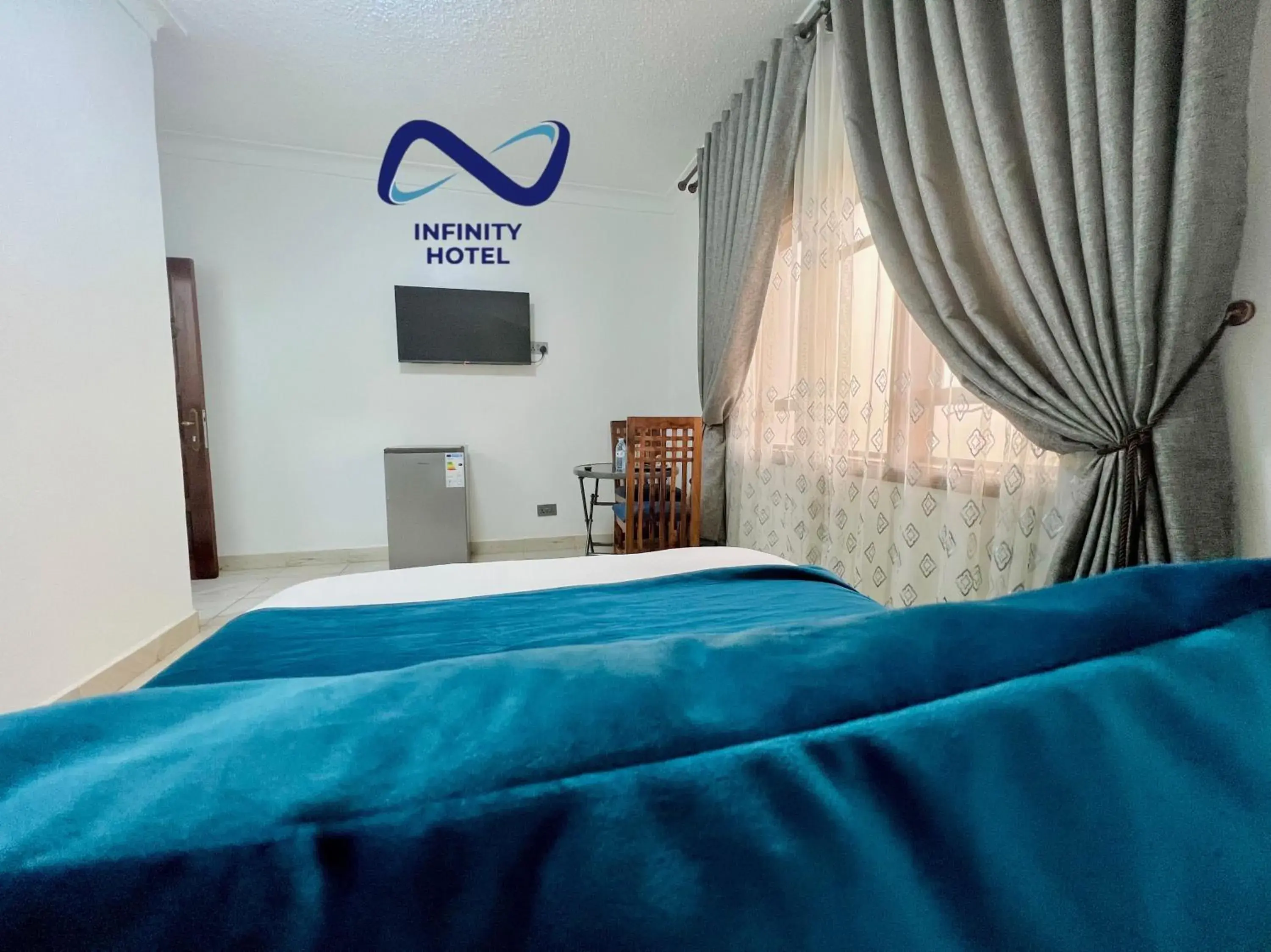 Bedroom, Bed in Infinity Hotel Kampala Bedroom, Bed in Infinity Hotel Kampala