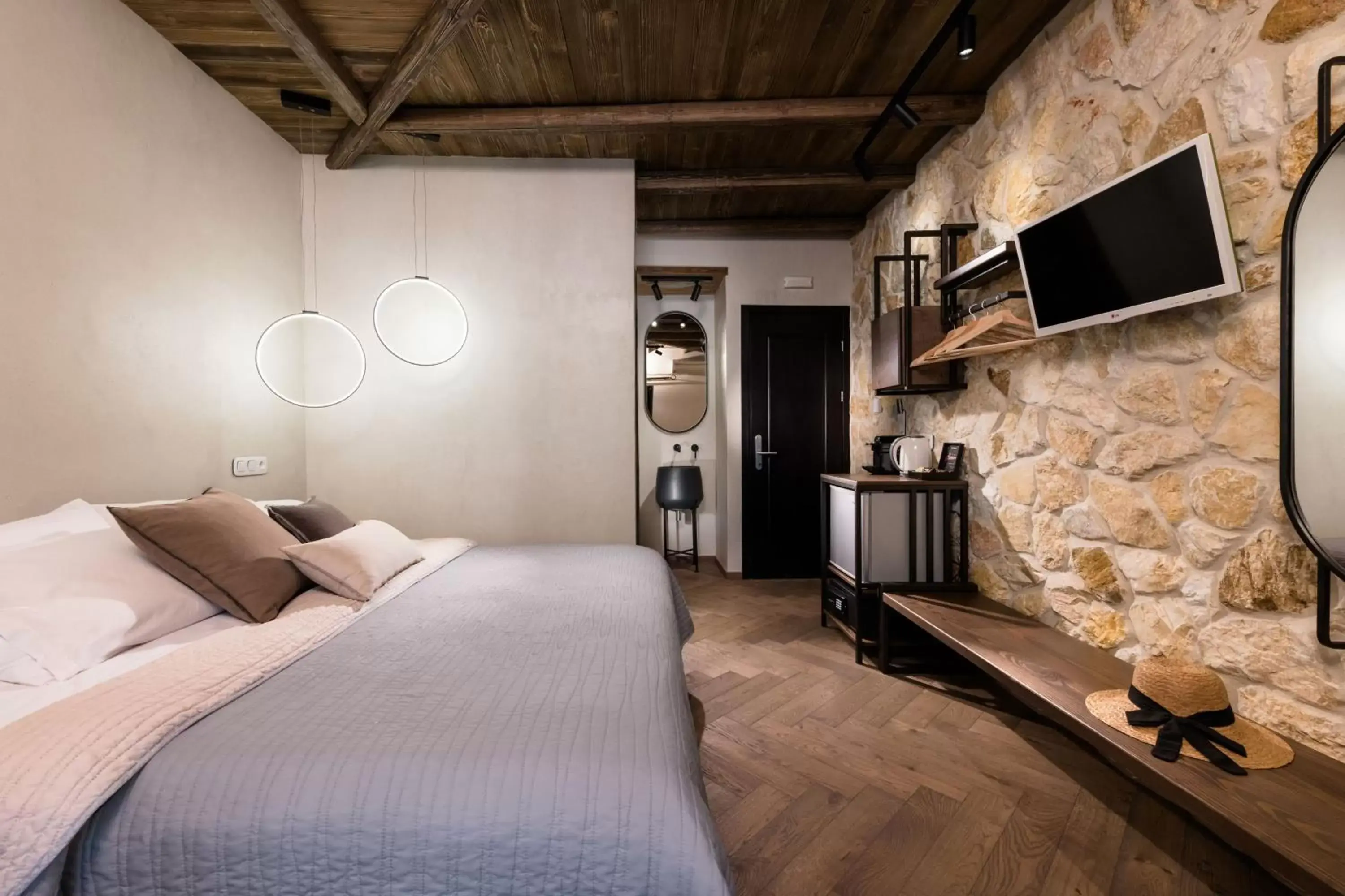 Bed in Tsikeli Boutique Hotel Meteora - Adults Friendly