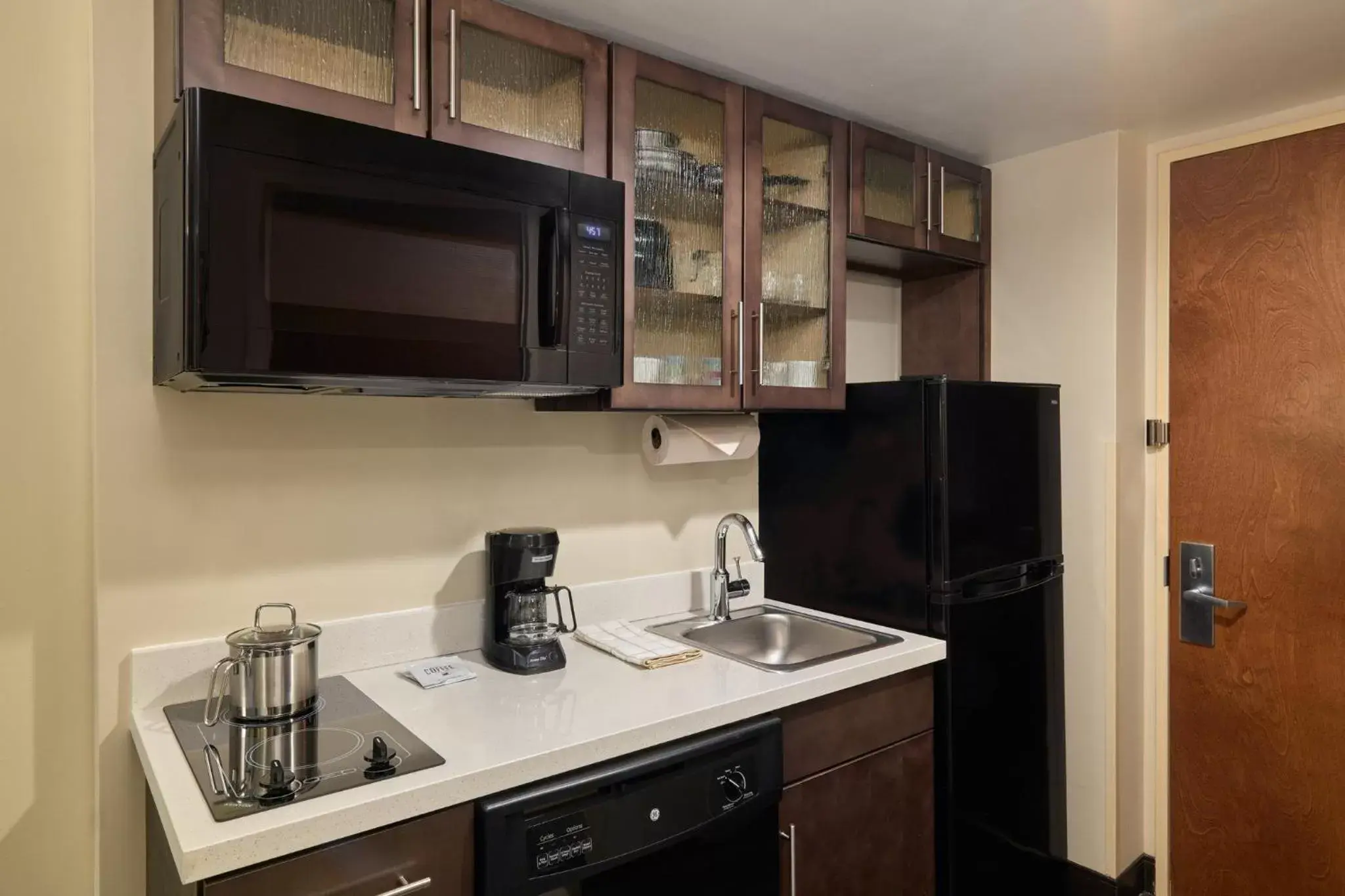 Photo of the whole room, Kitchen/Kitchenette in Candlewood Suites NYC -Times Square, an IHG Hotel