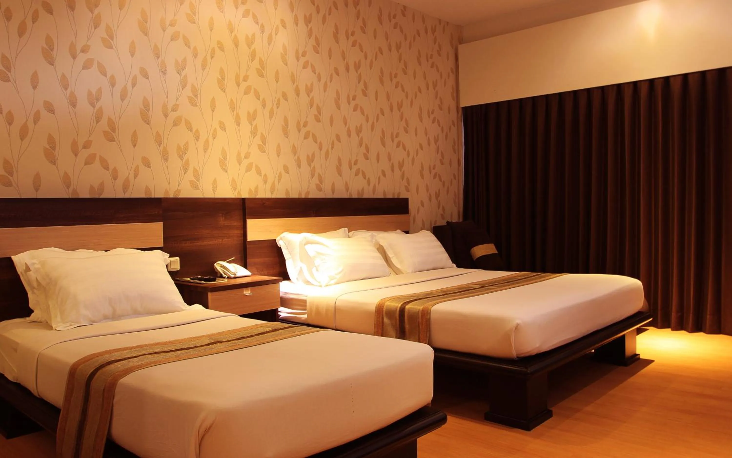 Bed in Kusuma Agrowisata Resort & Convention