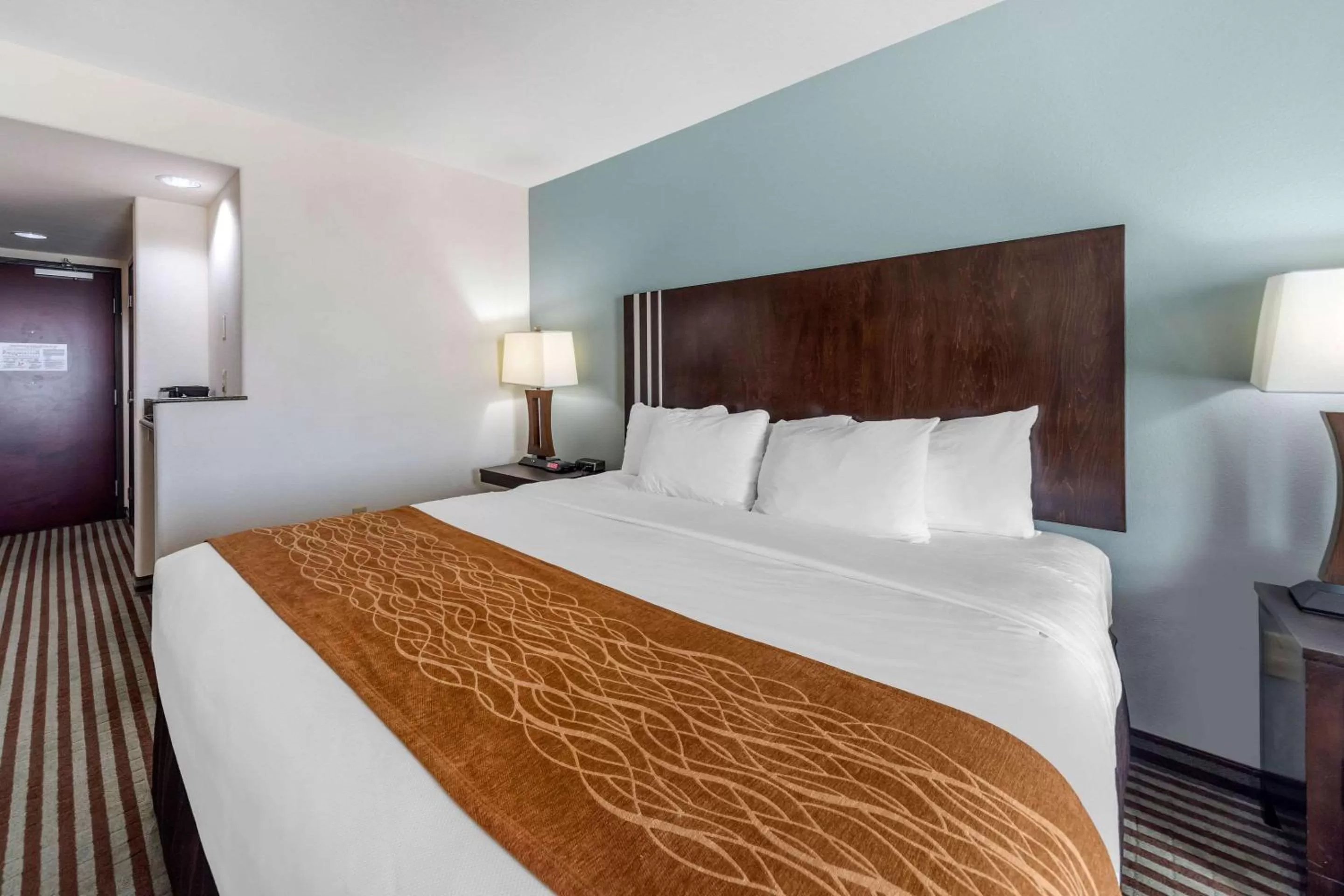 Photo of the whole room, Bed in Comfort Inn & Suites Perry I-35