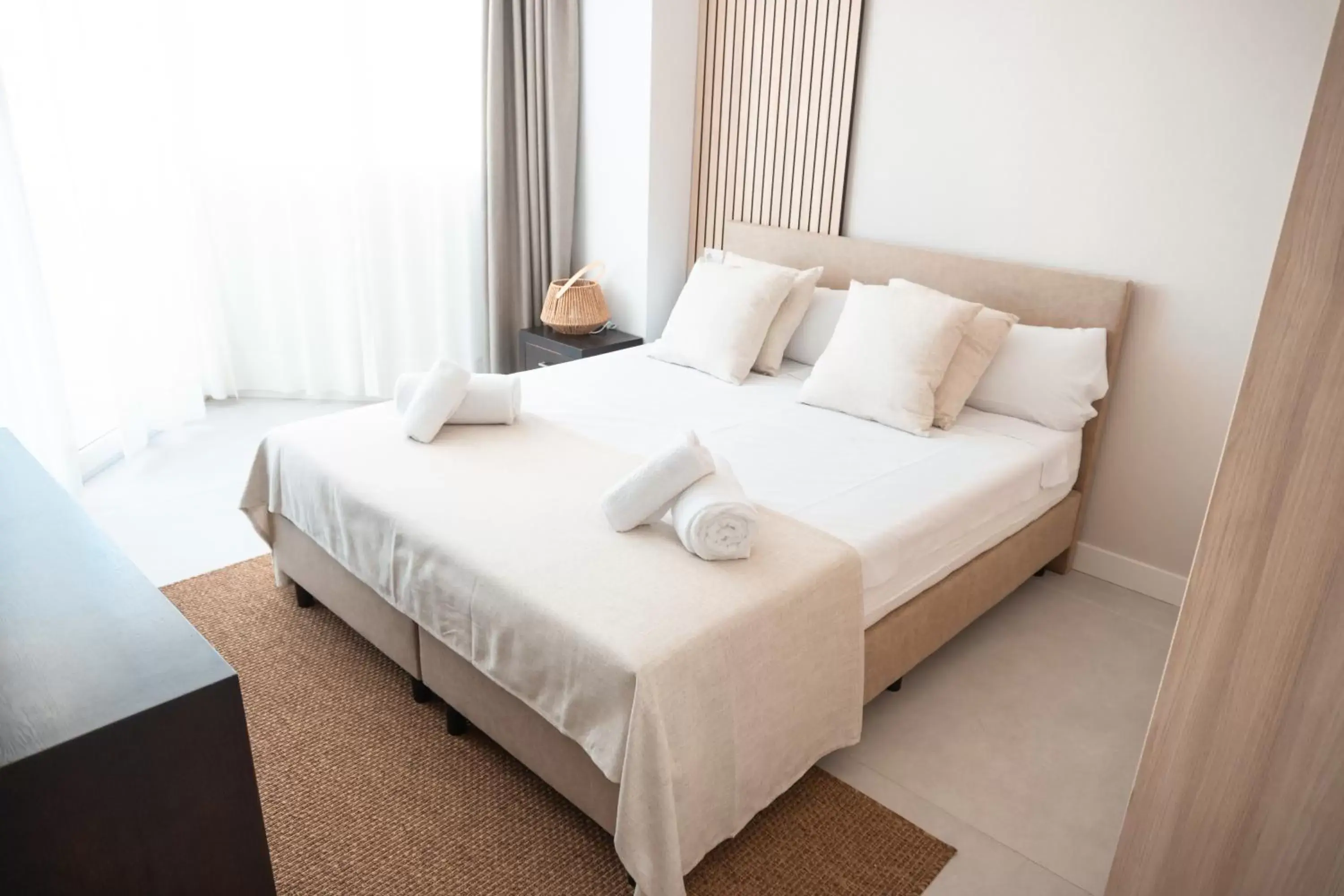 Bed in Portomar Apartments