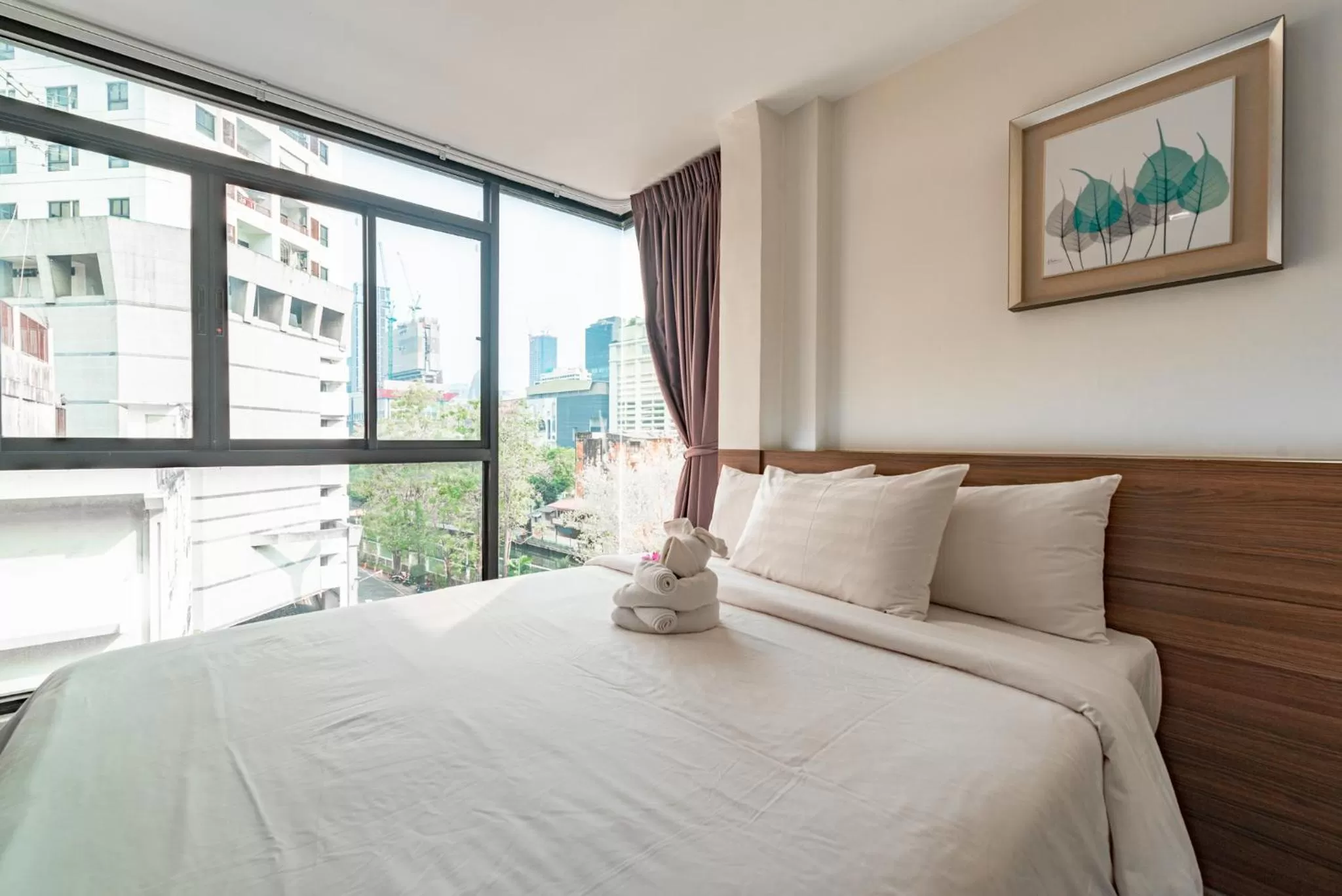 Bed in Sovereign Group Hotel at Pratunam