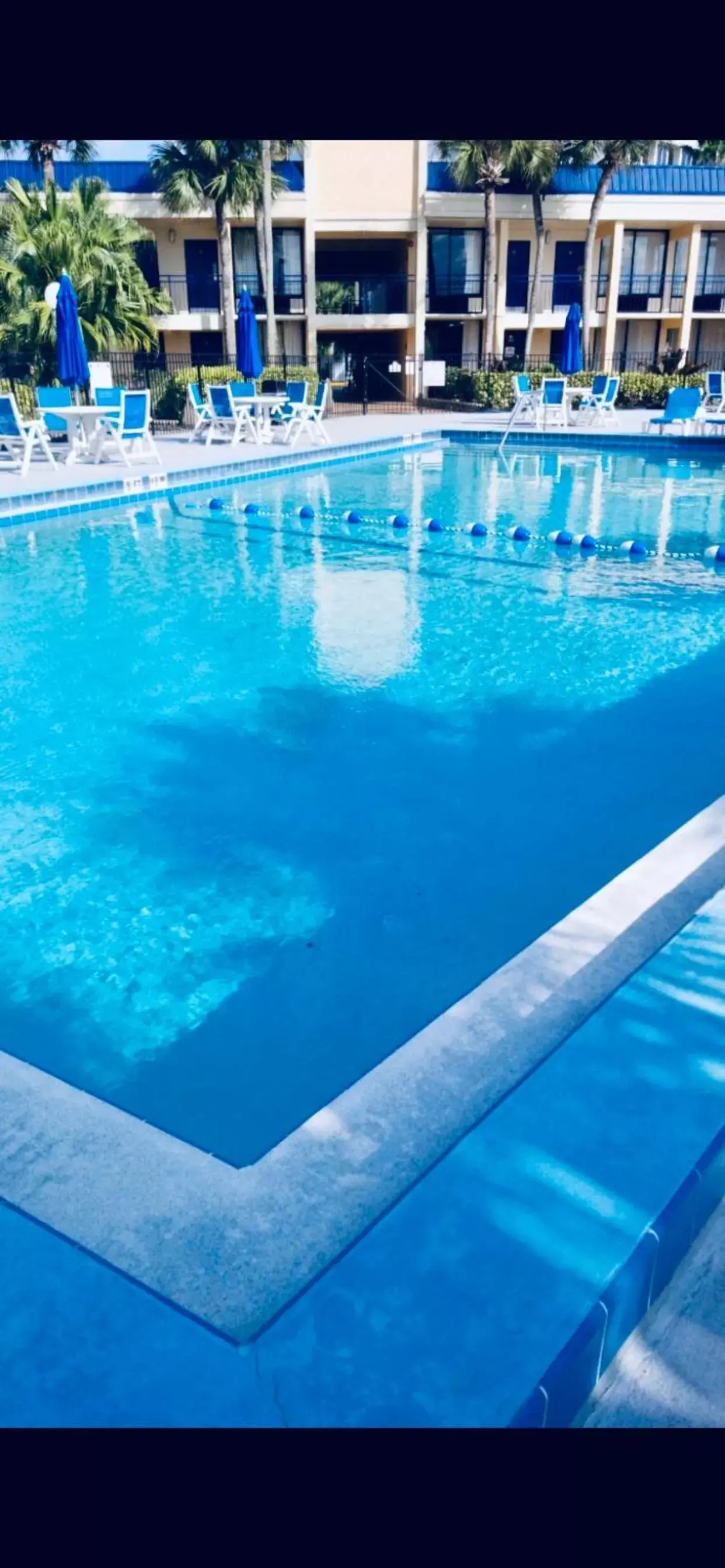Swimming Pool in Days Inn by Wyndham Orlando Airport Florida Mall