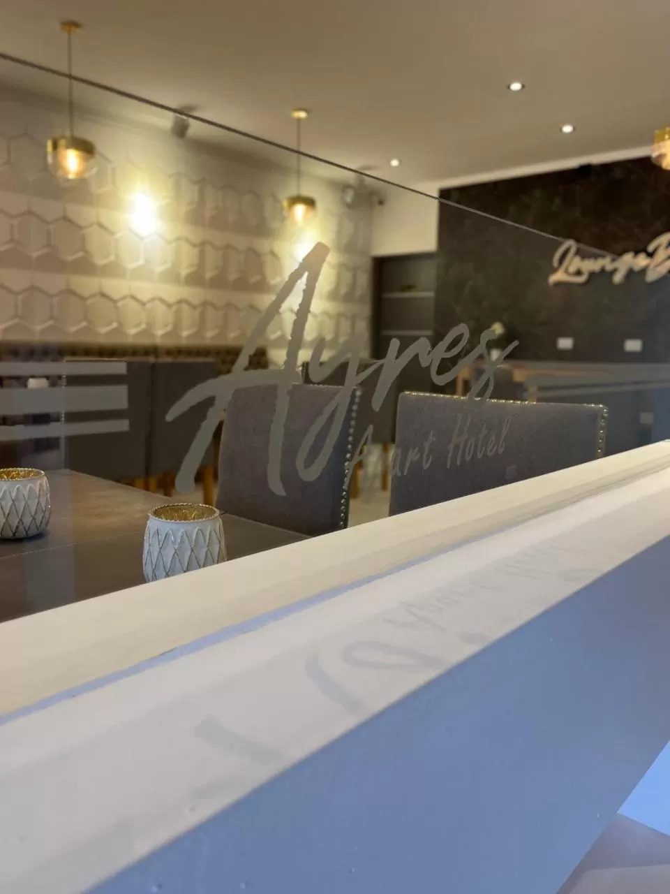 Seating area in Ayres Apart Hotel