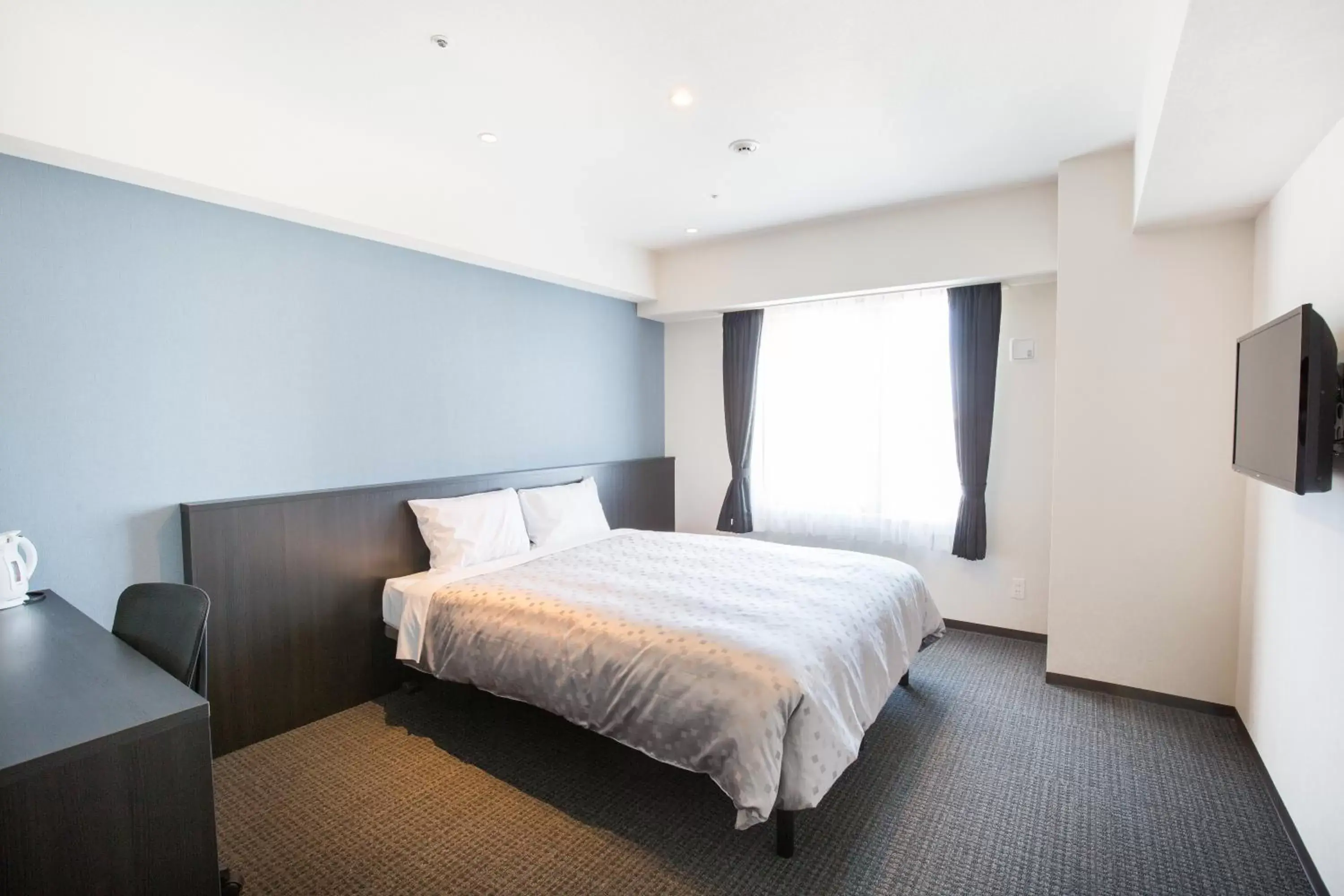 Bed in Hotel Bloemen North Hanazono