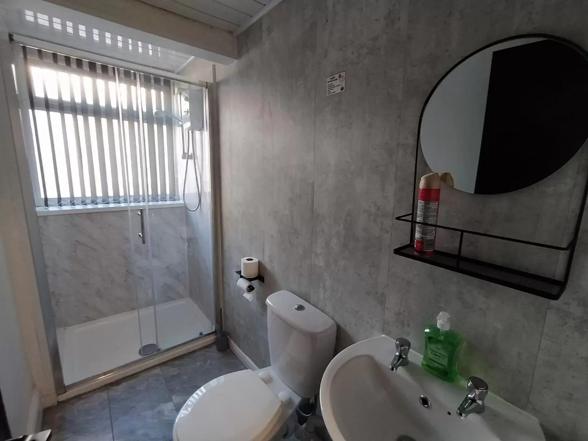 Bathroom in Black Ocean Holiday Apartments