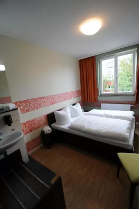 Photo of the whole room, Bed in HOLI-Berlin Hotel