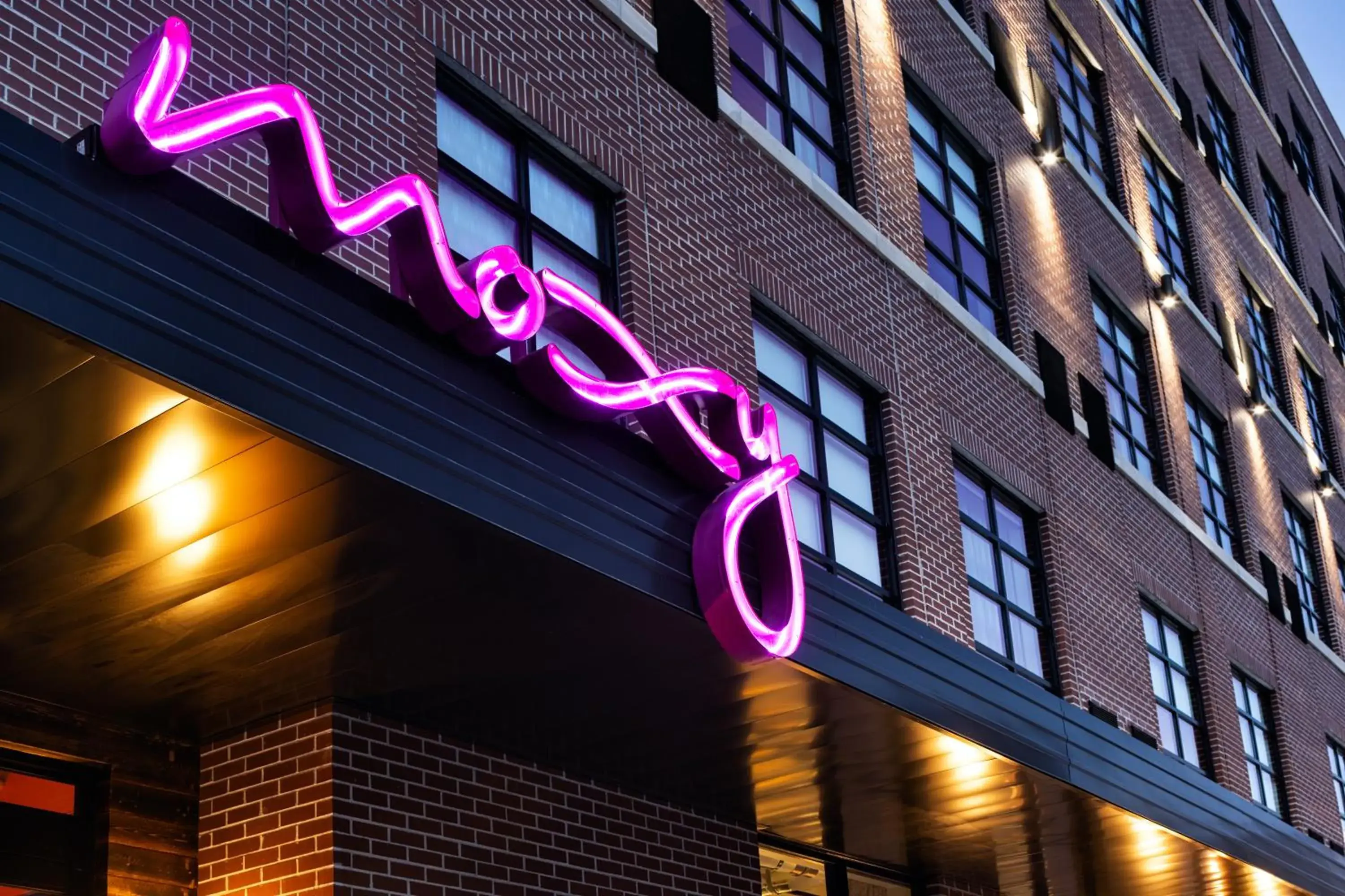 Property logo or sign in Moxy Omaha Downtown