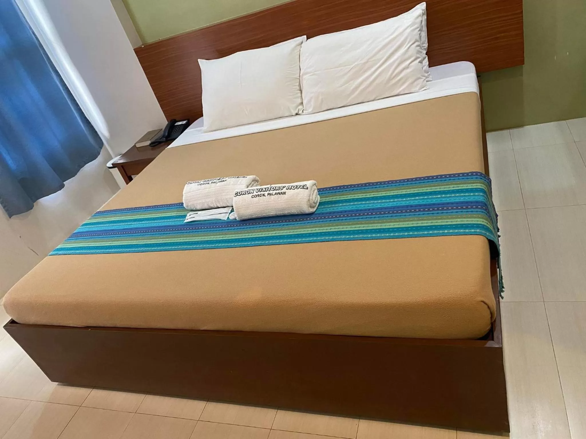 Bed in Coron Visitors Hotel
