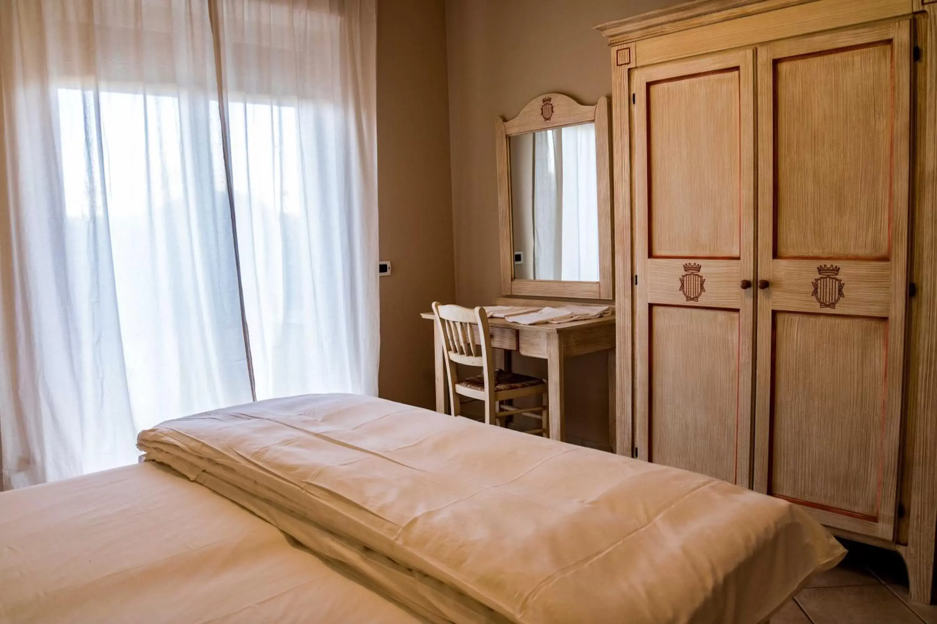 Bed in Le Residenze di Santa Costanza - Le Dimore