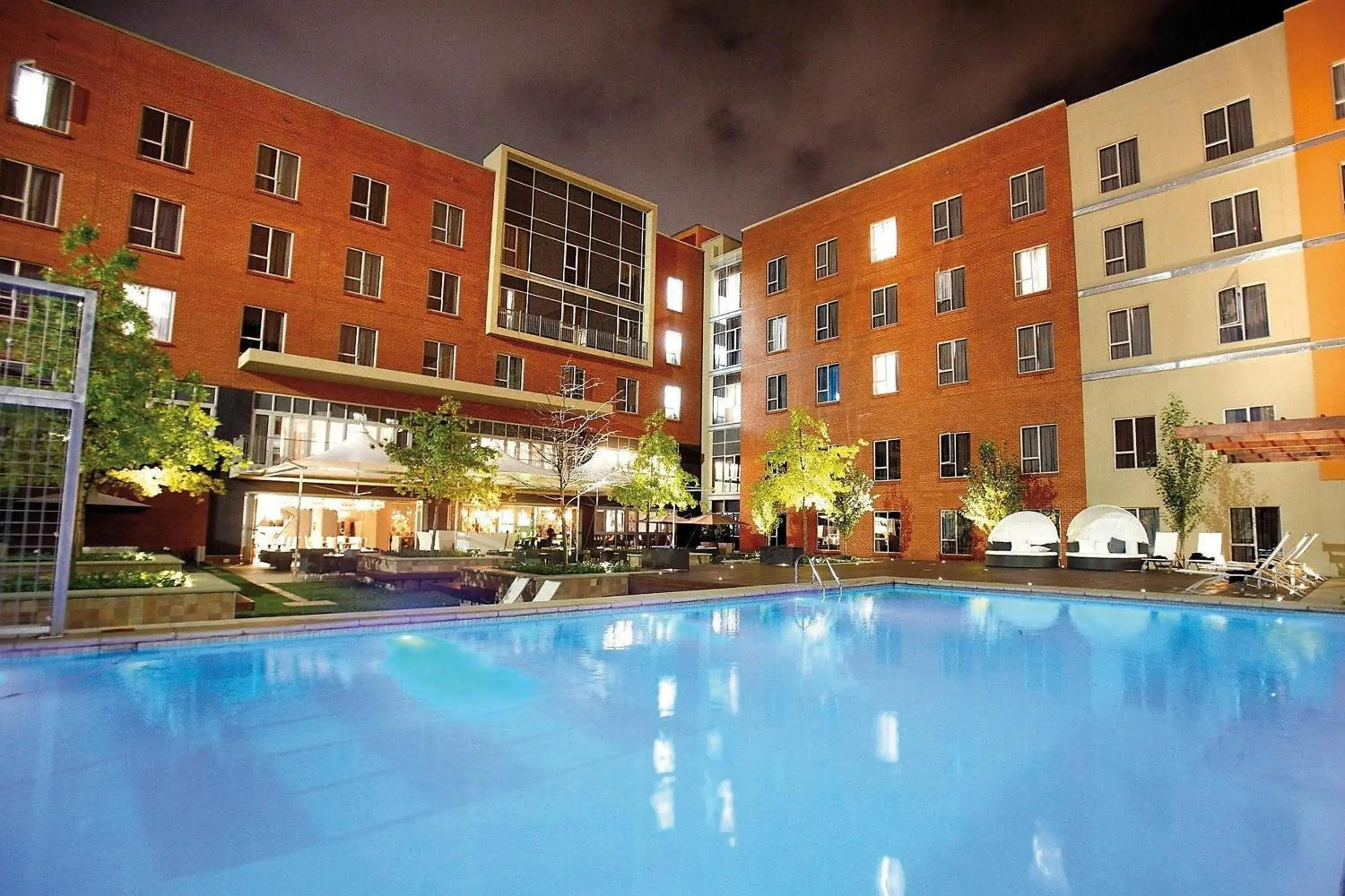 Swimming pool, Property Building in Protea Hotel by Marriott Fire & Ice Johannesburg Melrose Arch