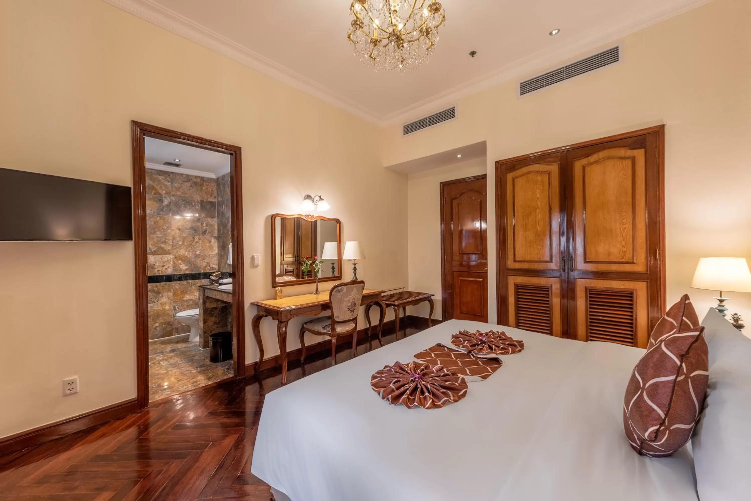 Photo of the whole room, Bed in Hotel Grand Saigon