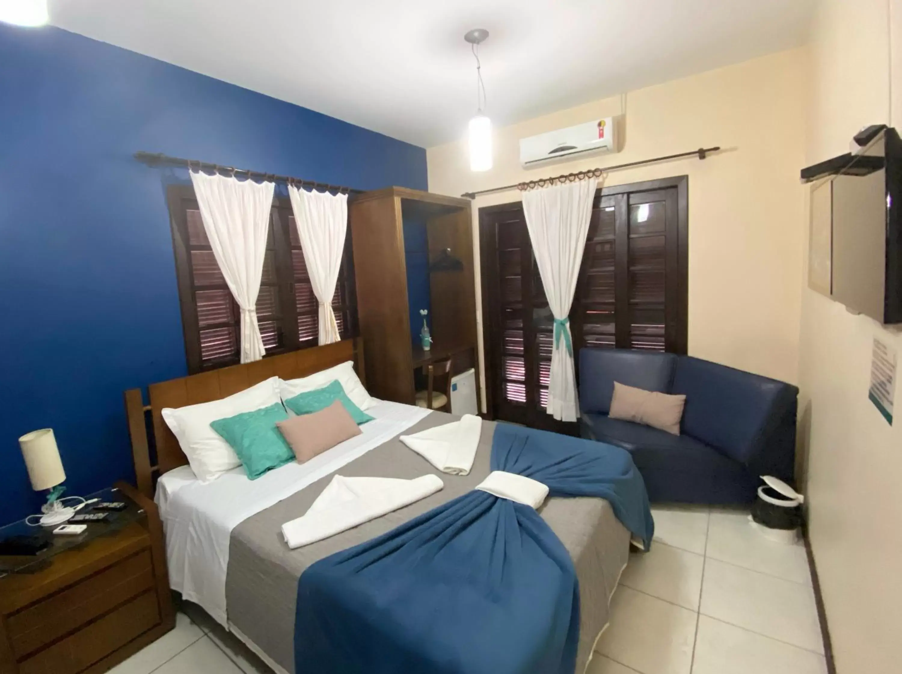 Deluxe Double Room with Balcony in Pousada Canasvieiras Deluxe Double Room with Balcony in Pousada Canasvieiras