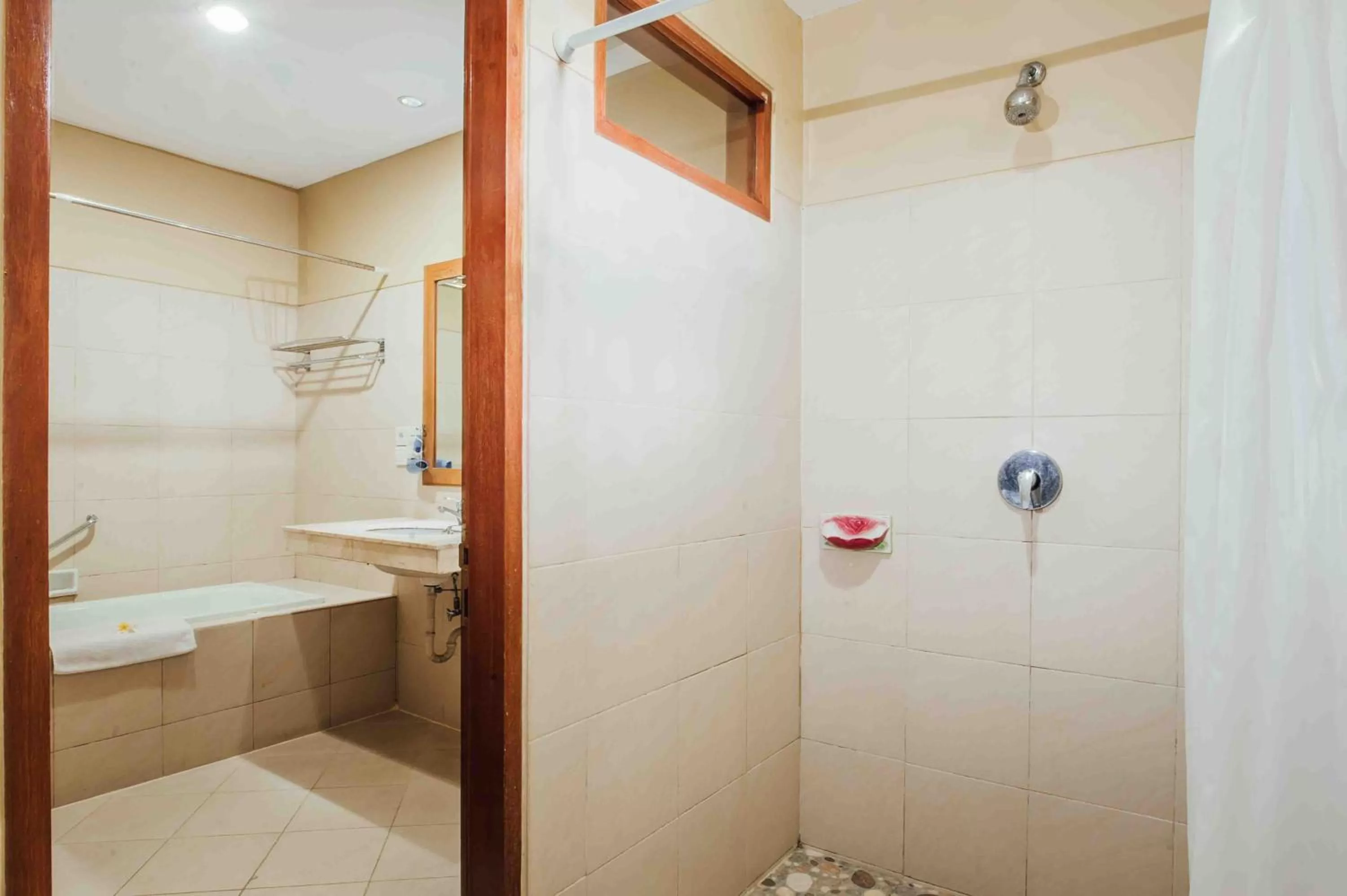 Bathroom in Kuta Puri Bungalows, Villas and Resort