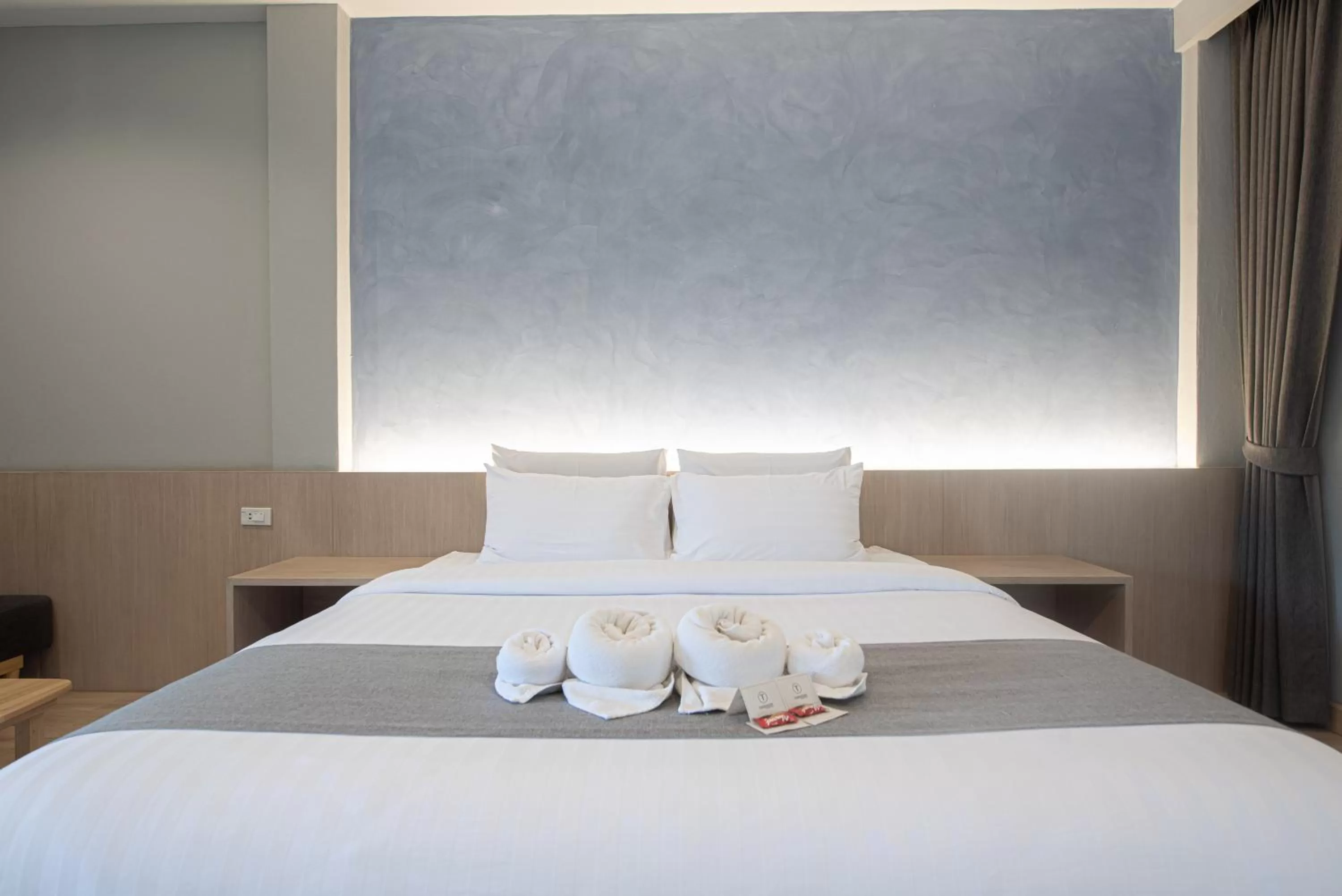 Bed in Tarnsiri Boutique Resort