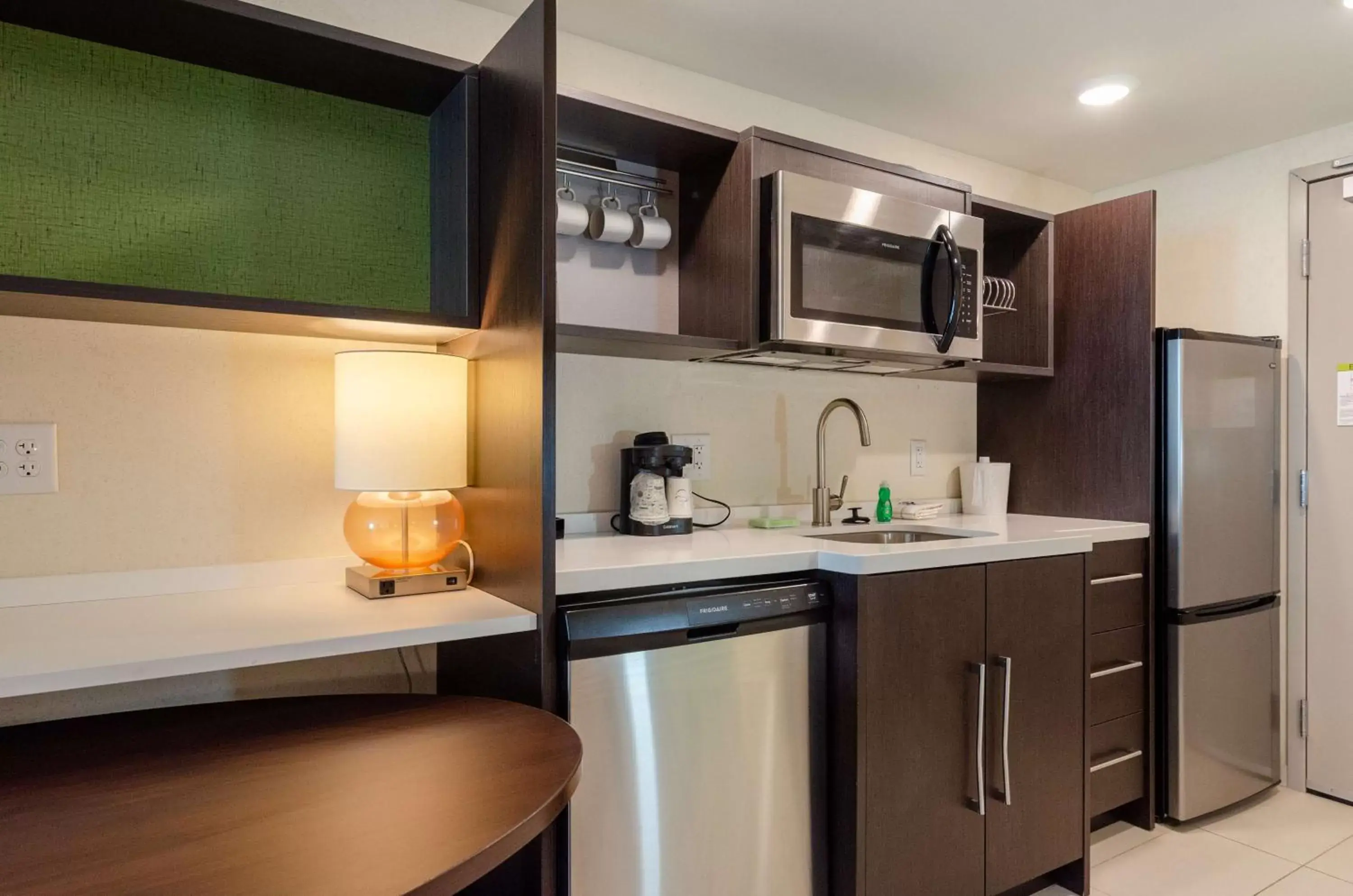 Kitchen or kitchenette, Kitchen/Kitchenette in Home2 Suites By Hilton Atlanta Camp Creek Parkway, Ga