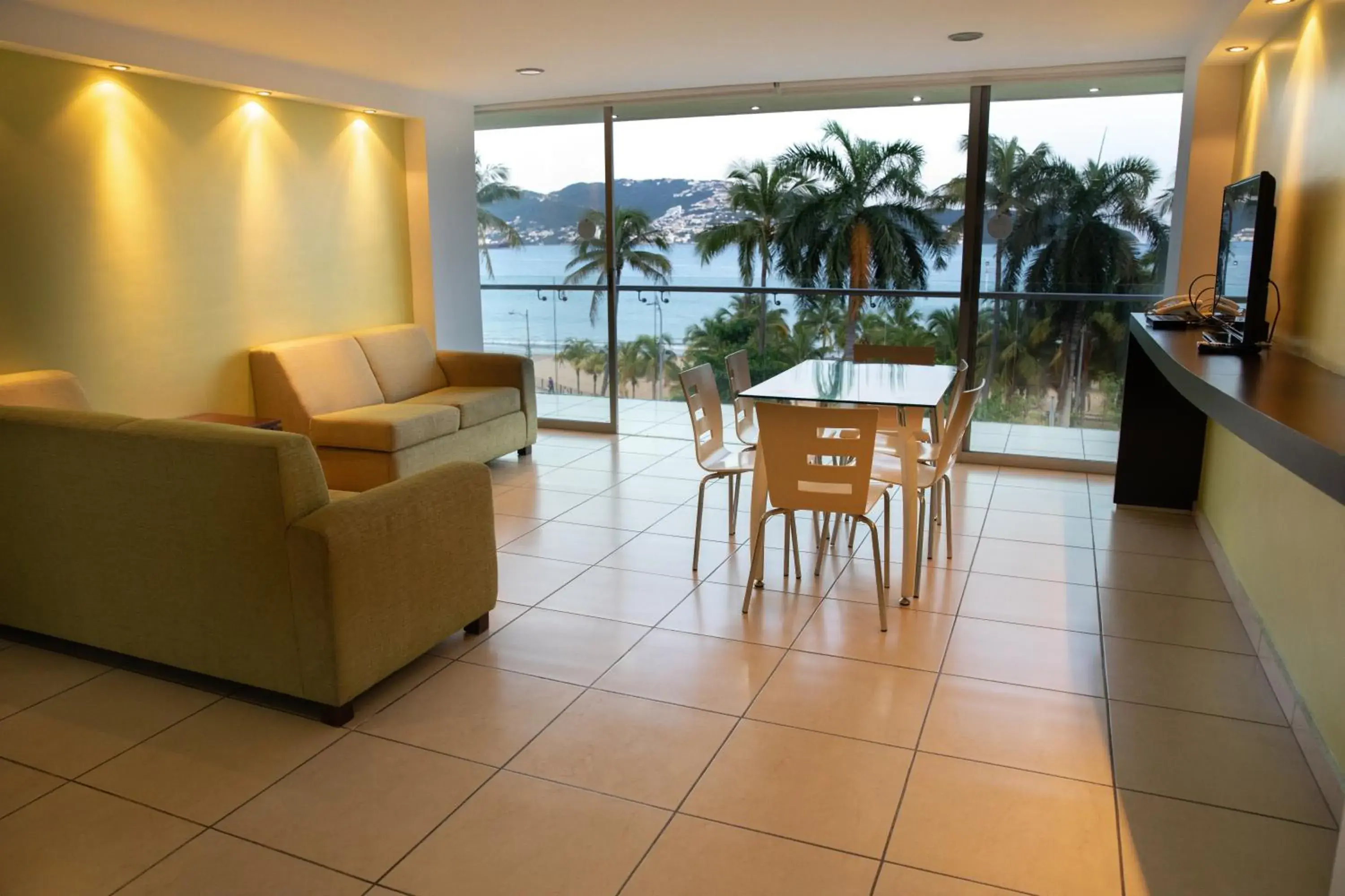 Living room in Ramada by Wyndham Acapulco Hotel & Suites