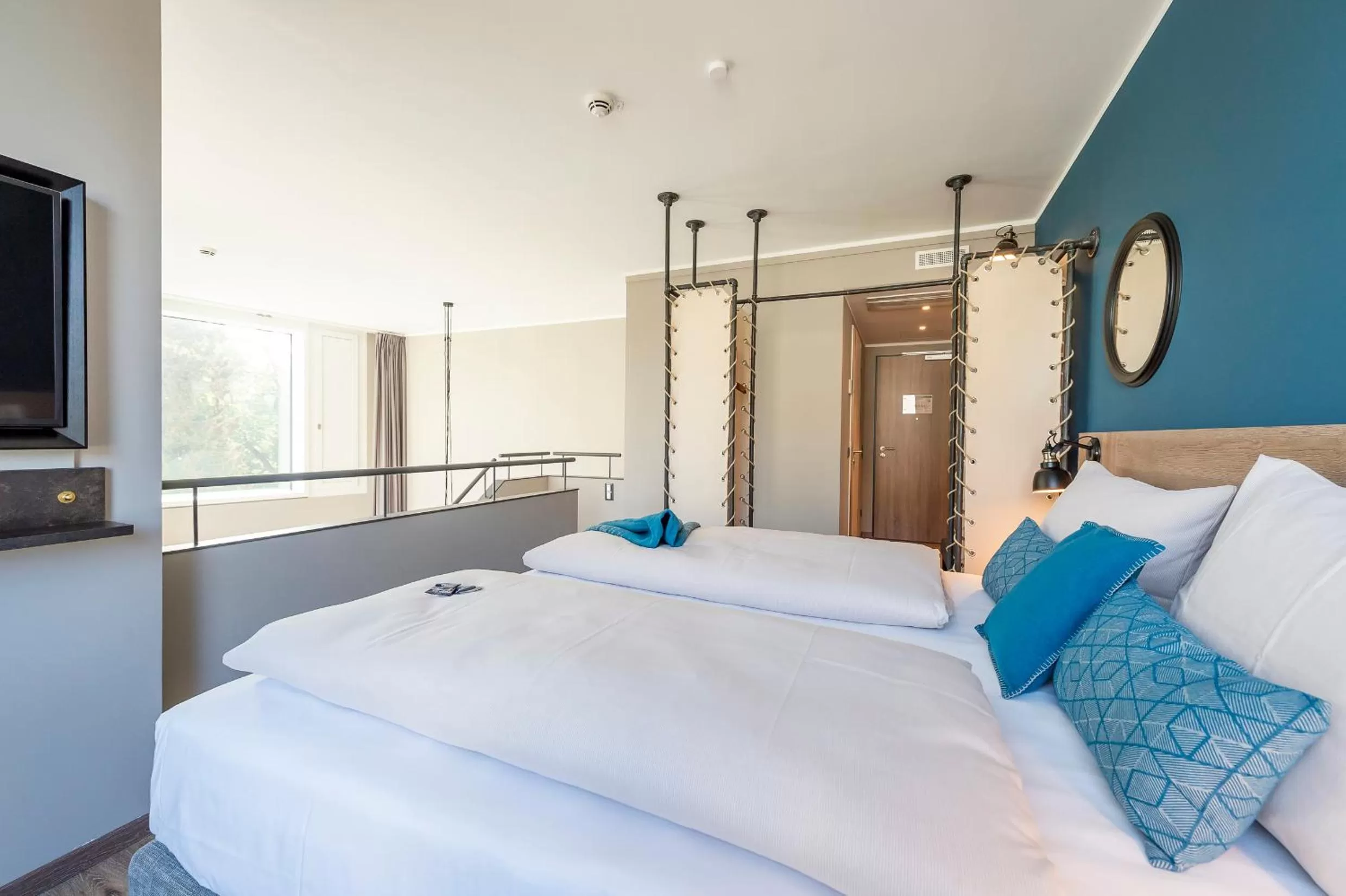 Bed in HARBR Hotel Konstanz, a member of Radisson Individuals