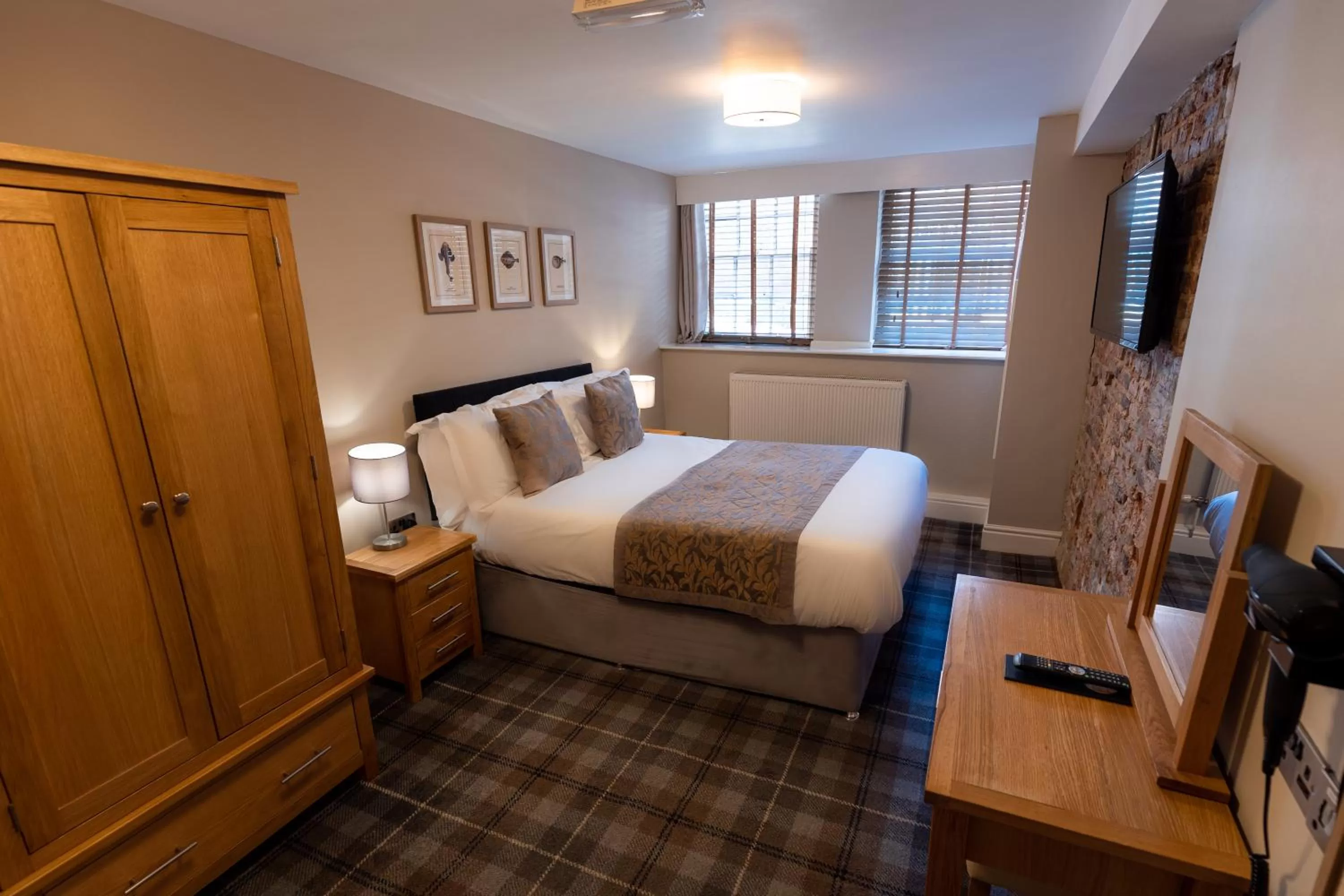 Bedroom in The Resolution Hotel