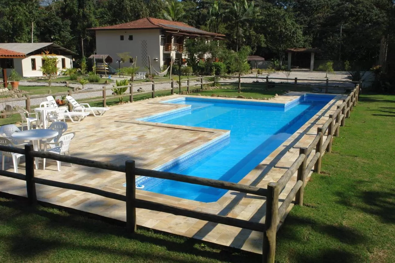 Swimming pool in Pousada Praia de Itamambuca