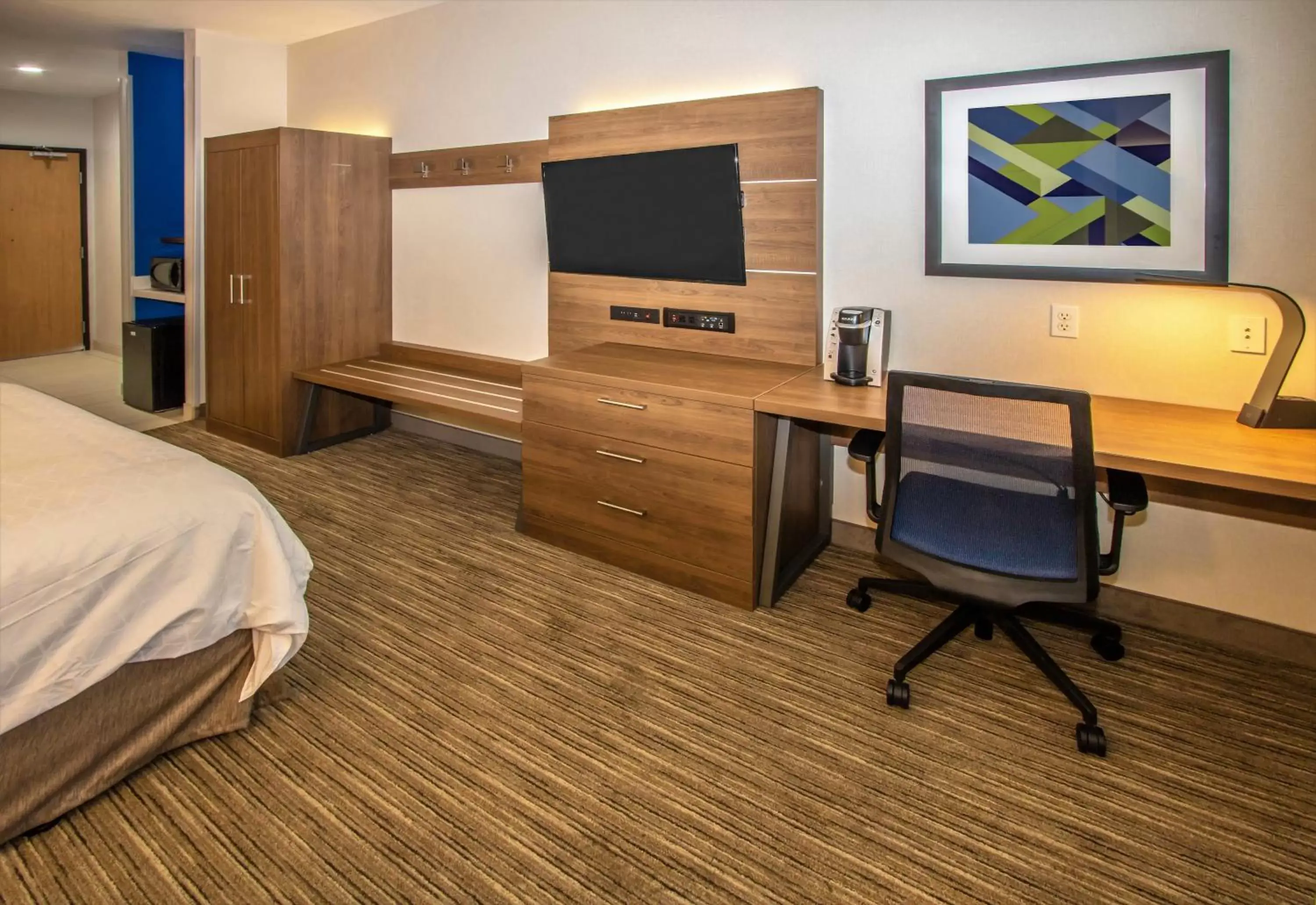 Photo of the whole room, TV/Entertainment Center in Holiday Inn Express Hotel & Suites Roseville - Galleria Area, an IHG Hotel