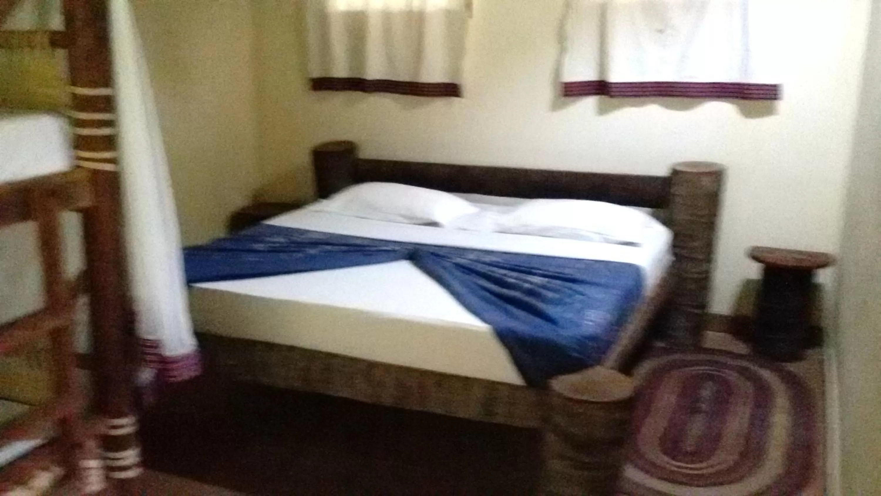 Bed in Bahari Pori Resort
