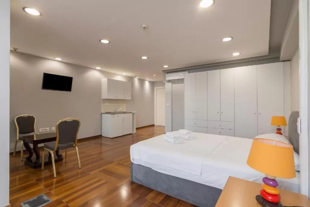 Bed in Arditou Akropolis Apartments-Suites