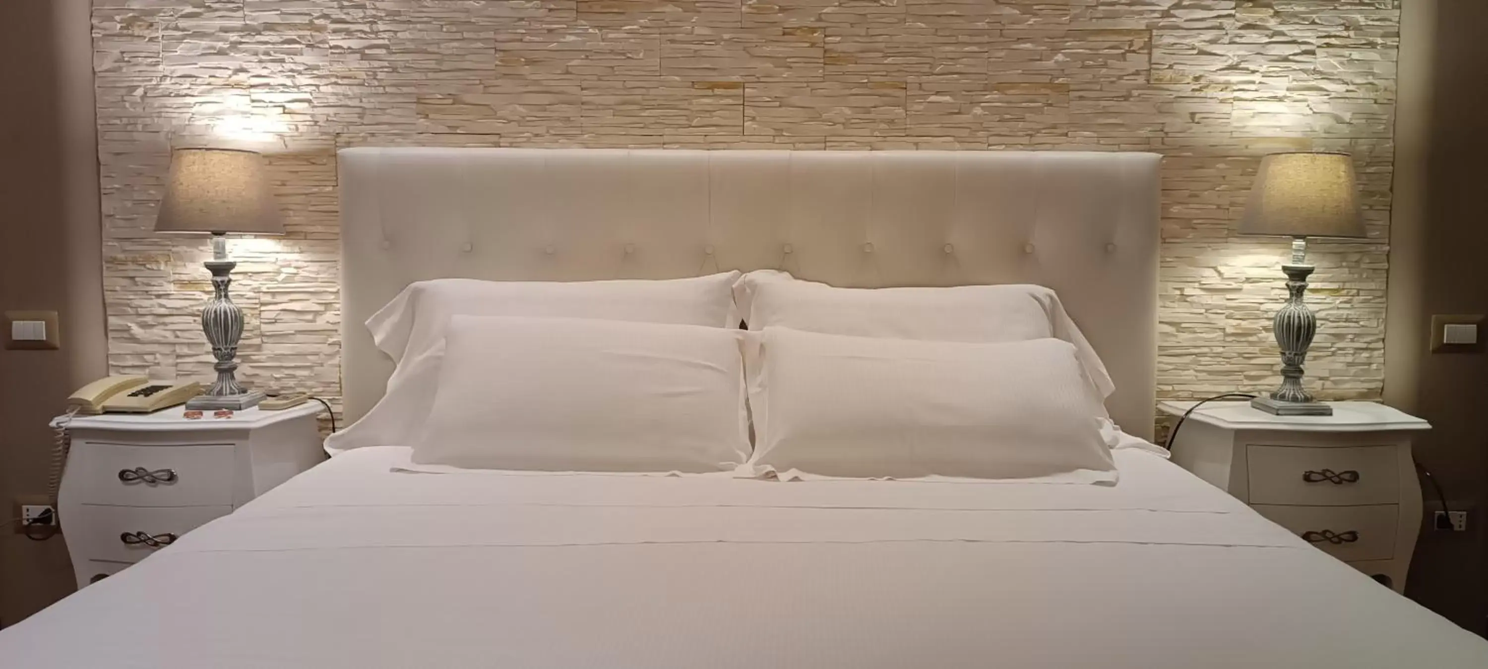 Bed in Hotel Palladium