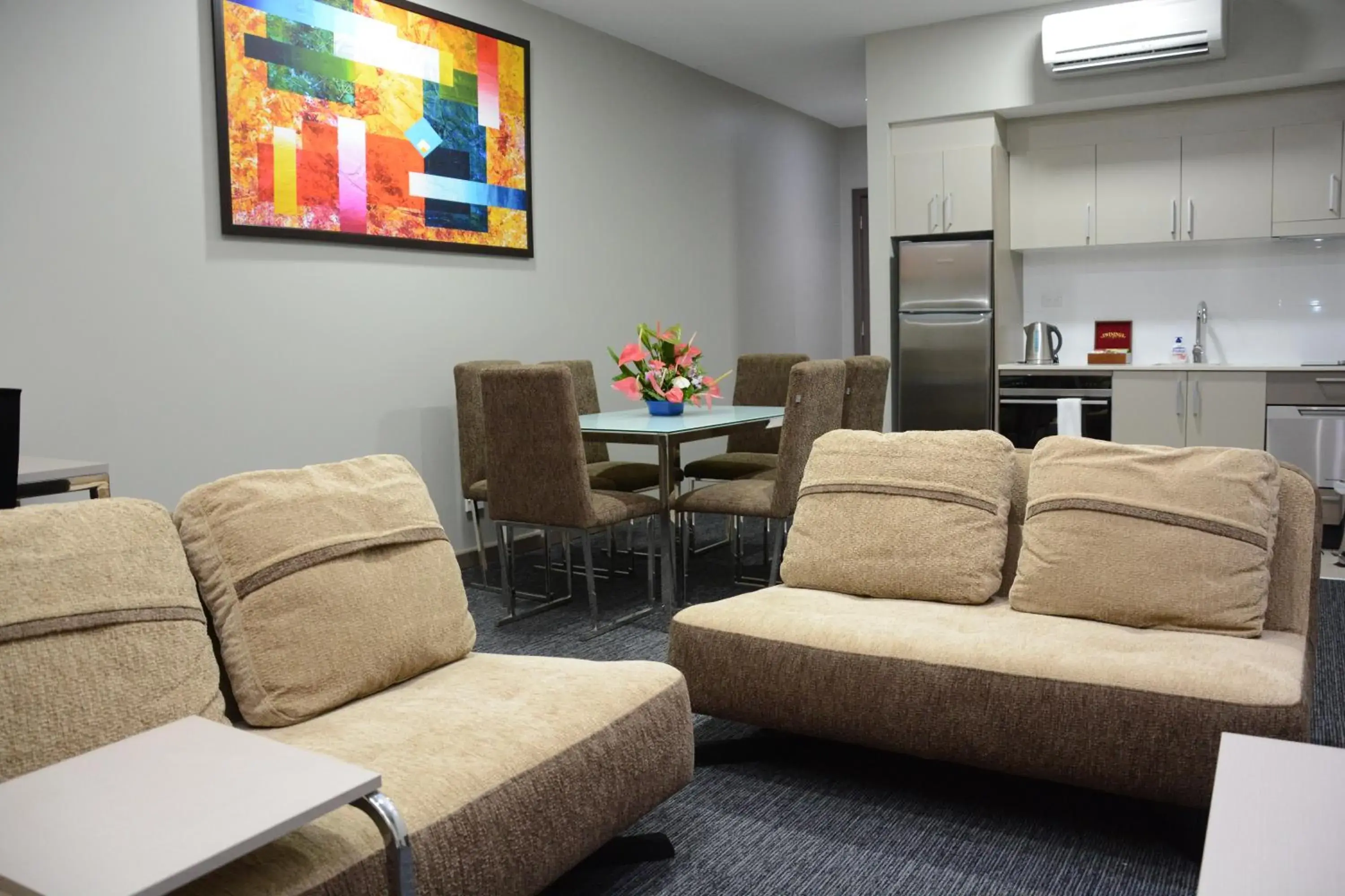 Kitchen or kitchenette, Seating Area in Ratsun Nadi Airport Apartment Hotel
