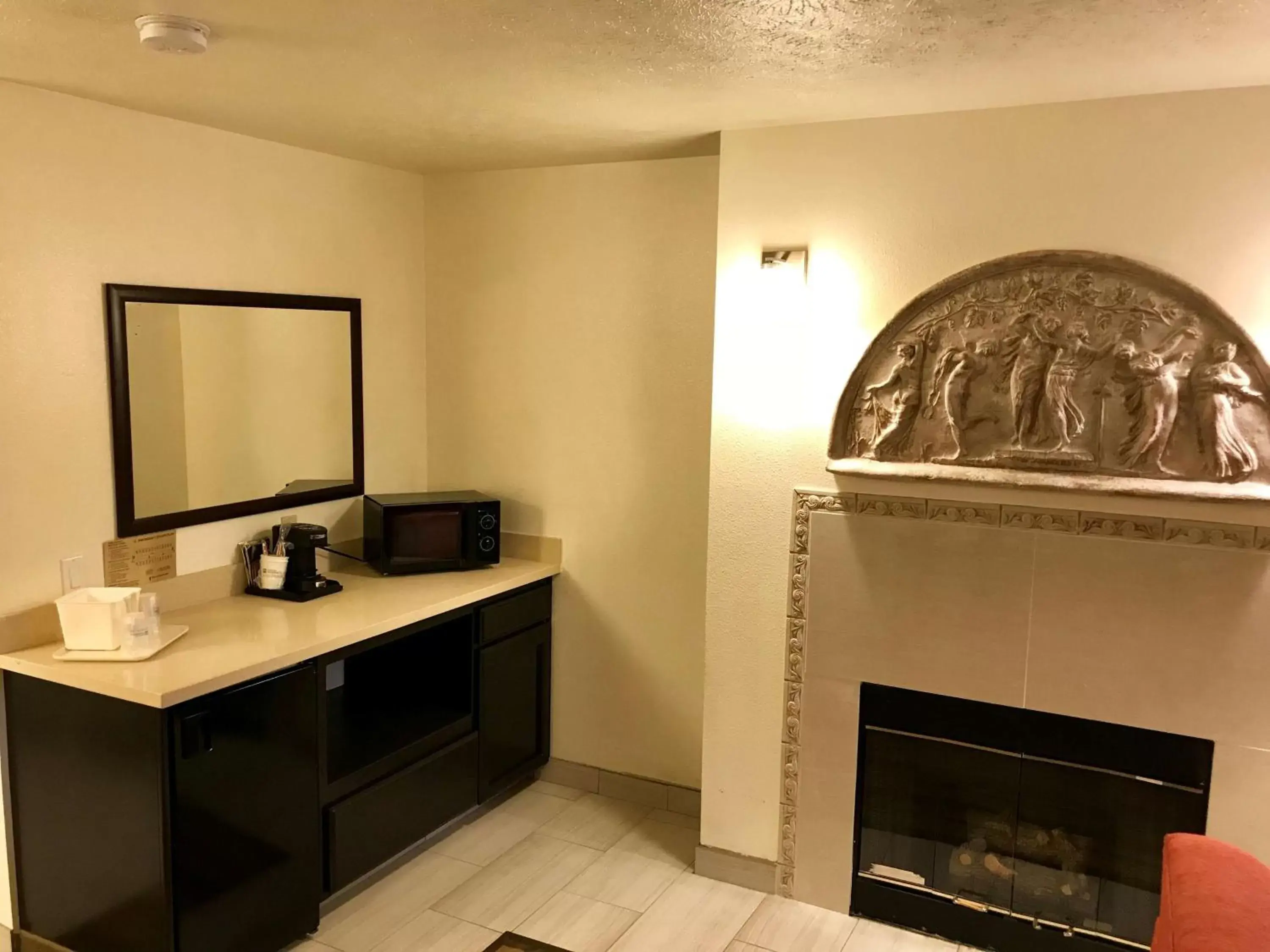 Photo of the whole room, TV/Entertainment Center in Best Western Visalia Hotel