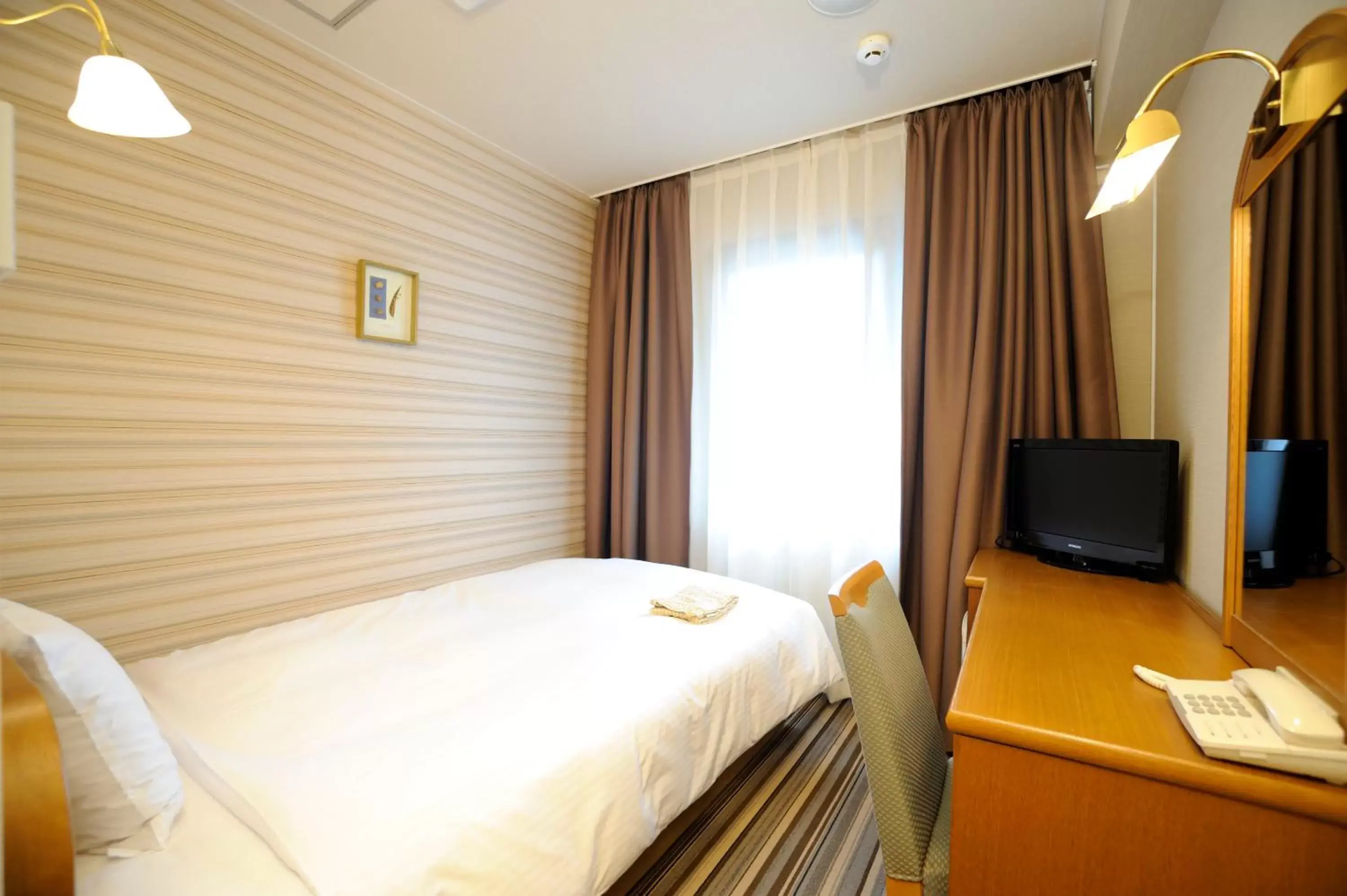 Photo of the whole room, Bed in Hotel Eclair Hakata