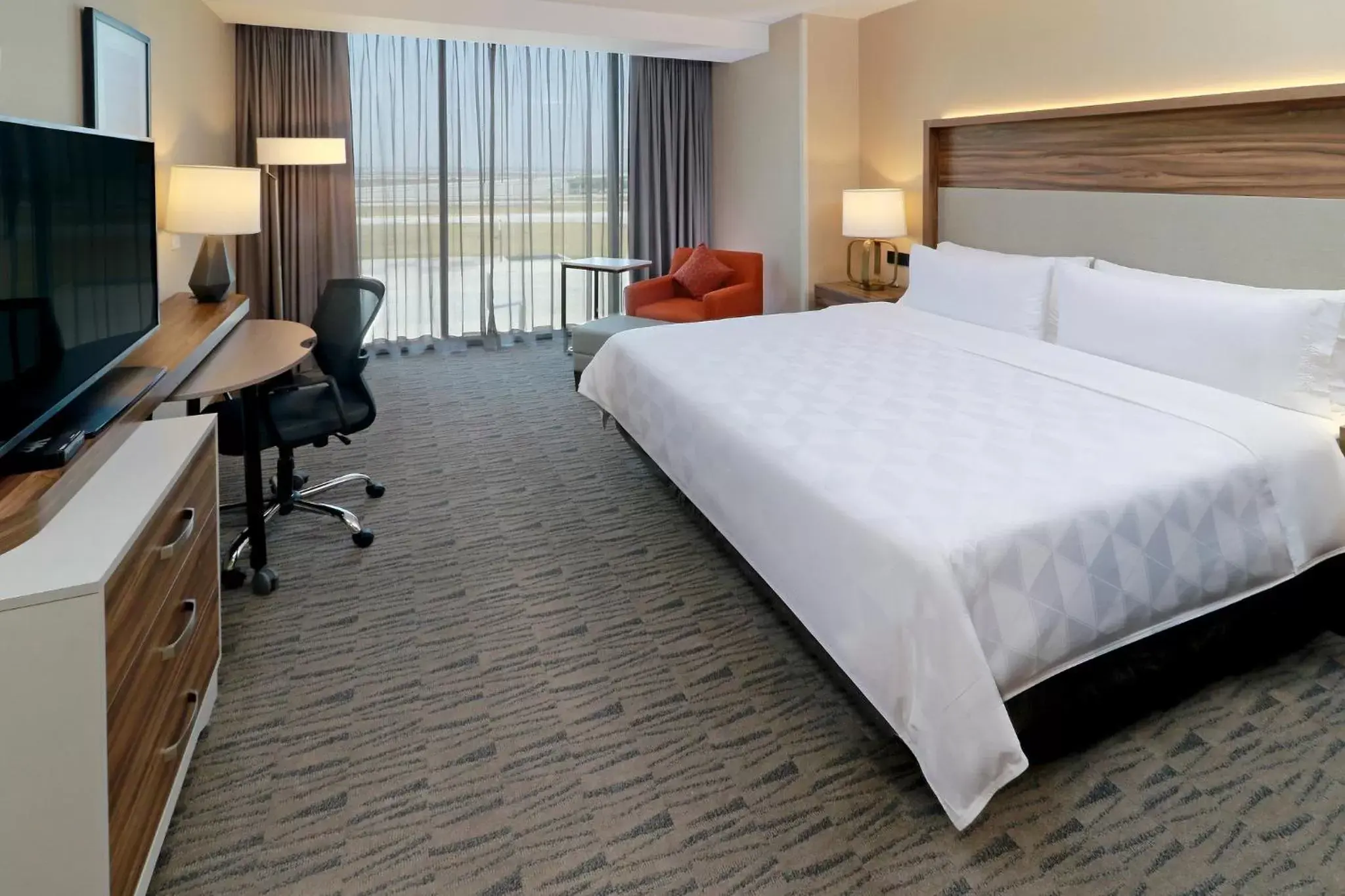 Photo of the whole room, Bed in Holiday Inn & Suites - Mexico Felipe Angeles Airport, an IHG Hotel