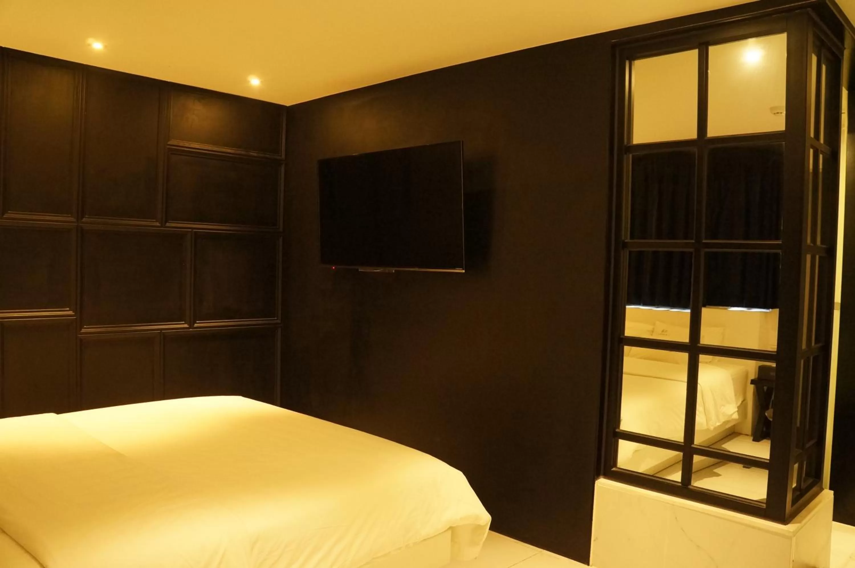 Bed in SOYU Hotel