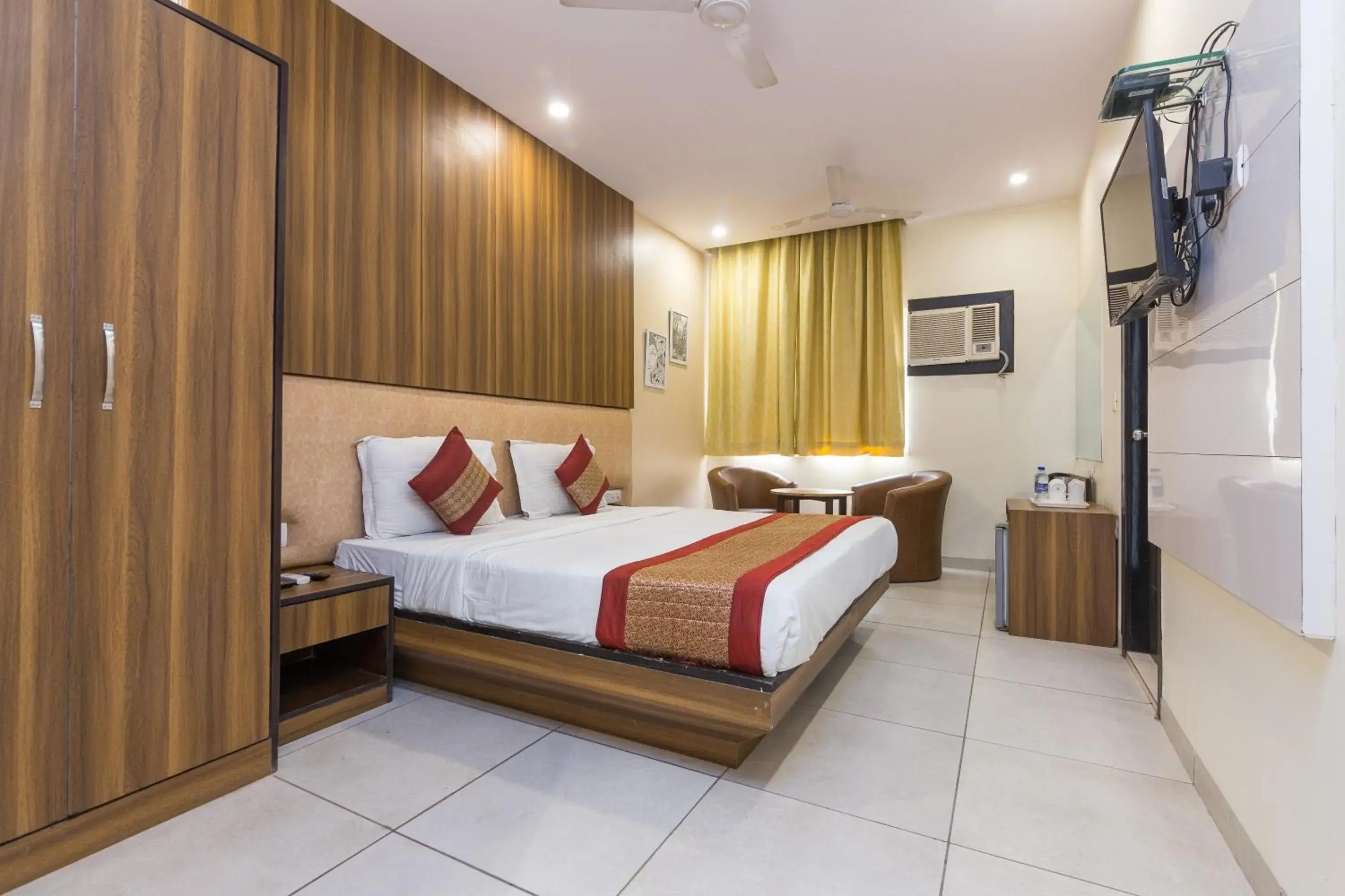 Photo of the whole room, Bed in Rupam Hotel