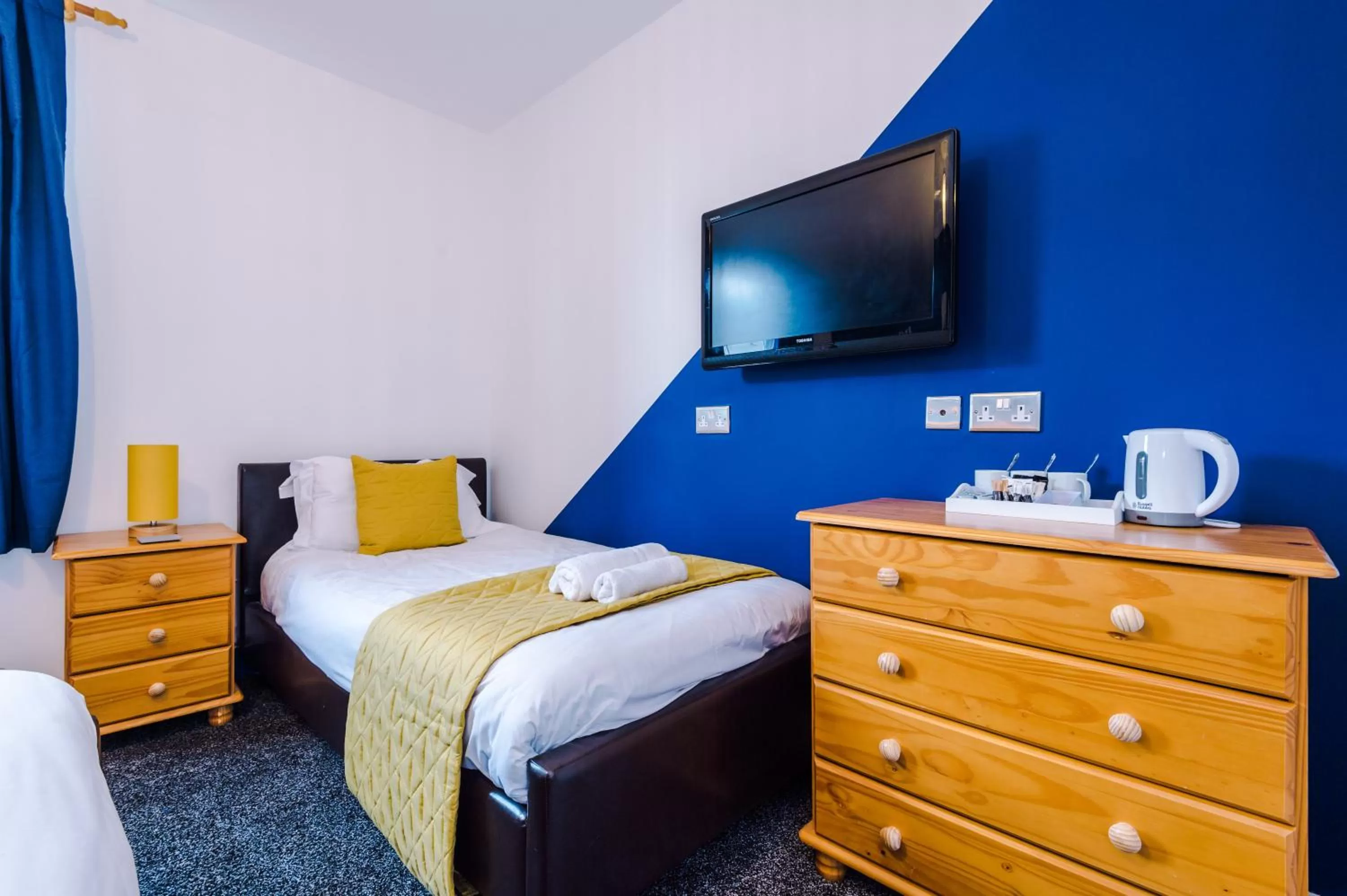 Bed in Pebbles Guest House