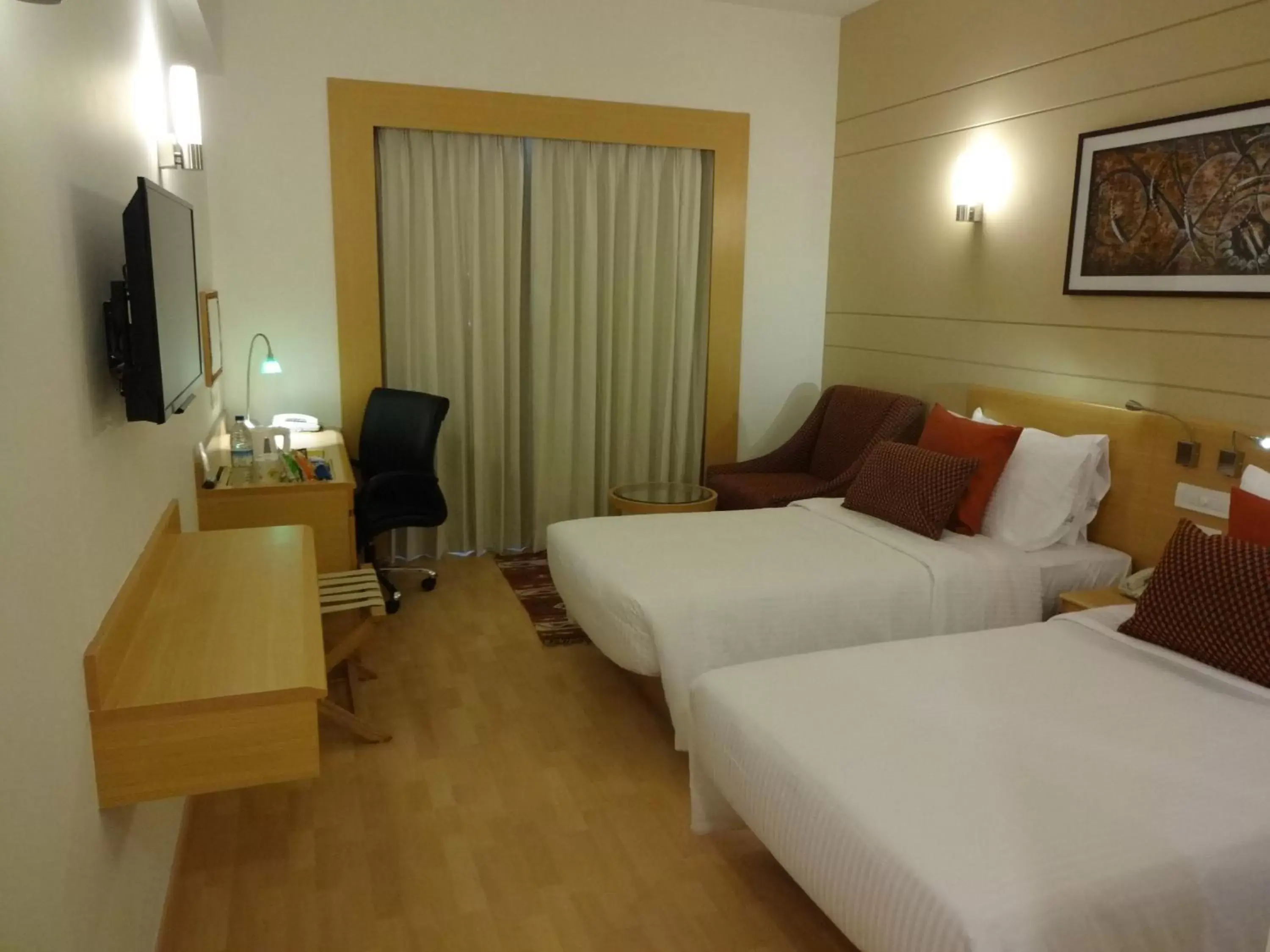 Photo of the whole room, Bed in Lemon Tree Hotel, Gachibowli, Hyderabad