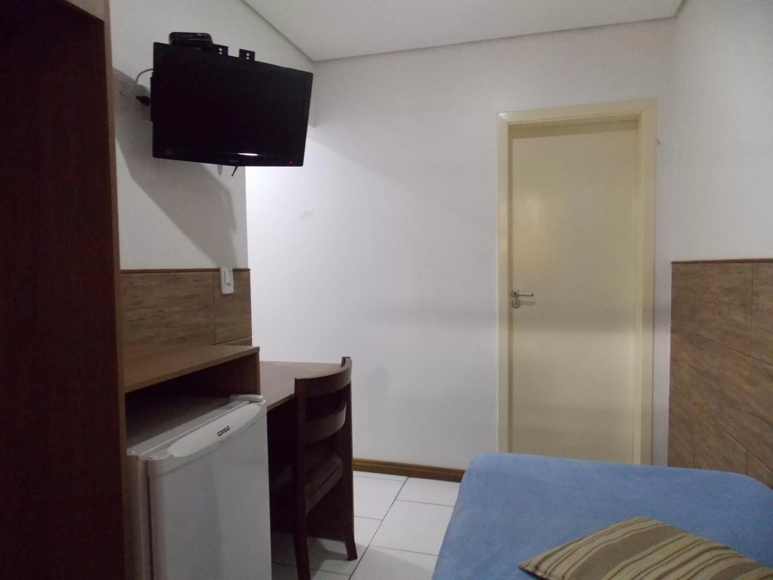 Bedroom, TV/Entertainment Center in Hotel Visão