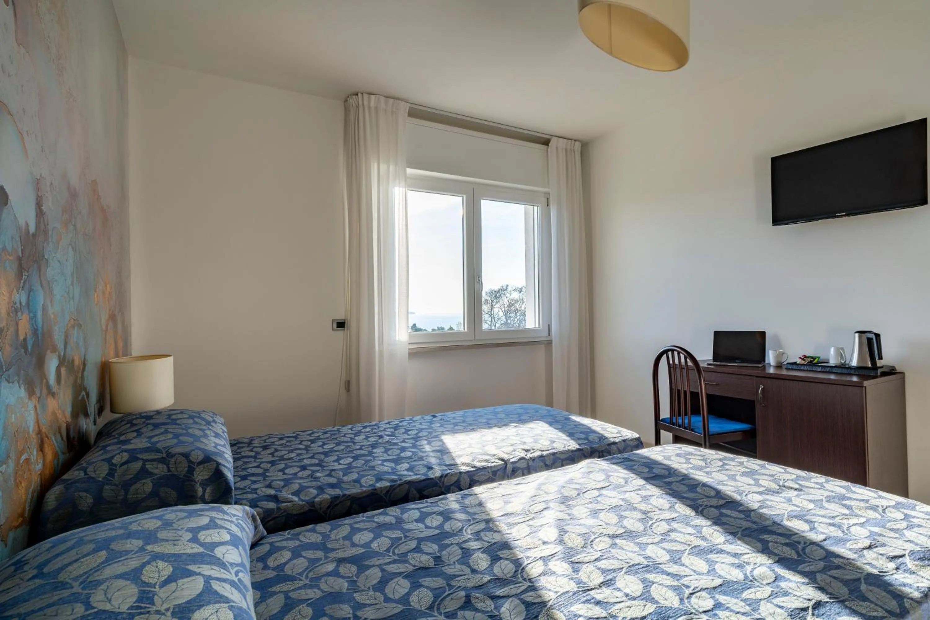 Bed in Hotel Sorriso