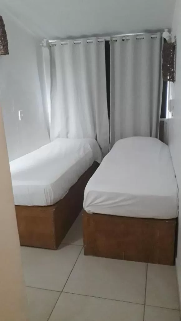 Bed in Pousada Boa Vida