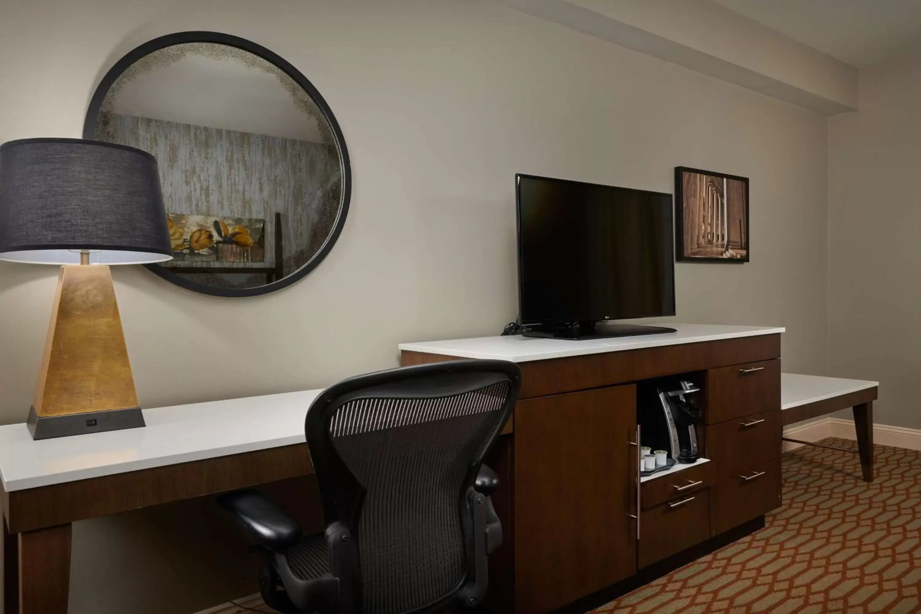 Bed, TV/Entertainment Center in Virginia Crossings Hotel, Tapestry Collection by Hilton