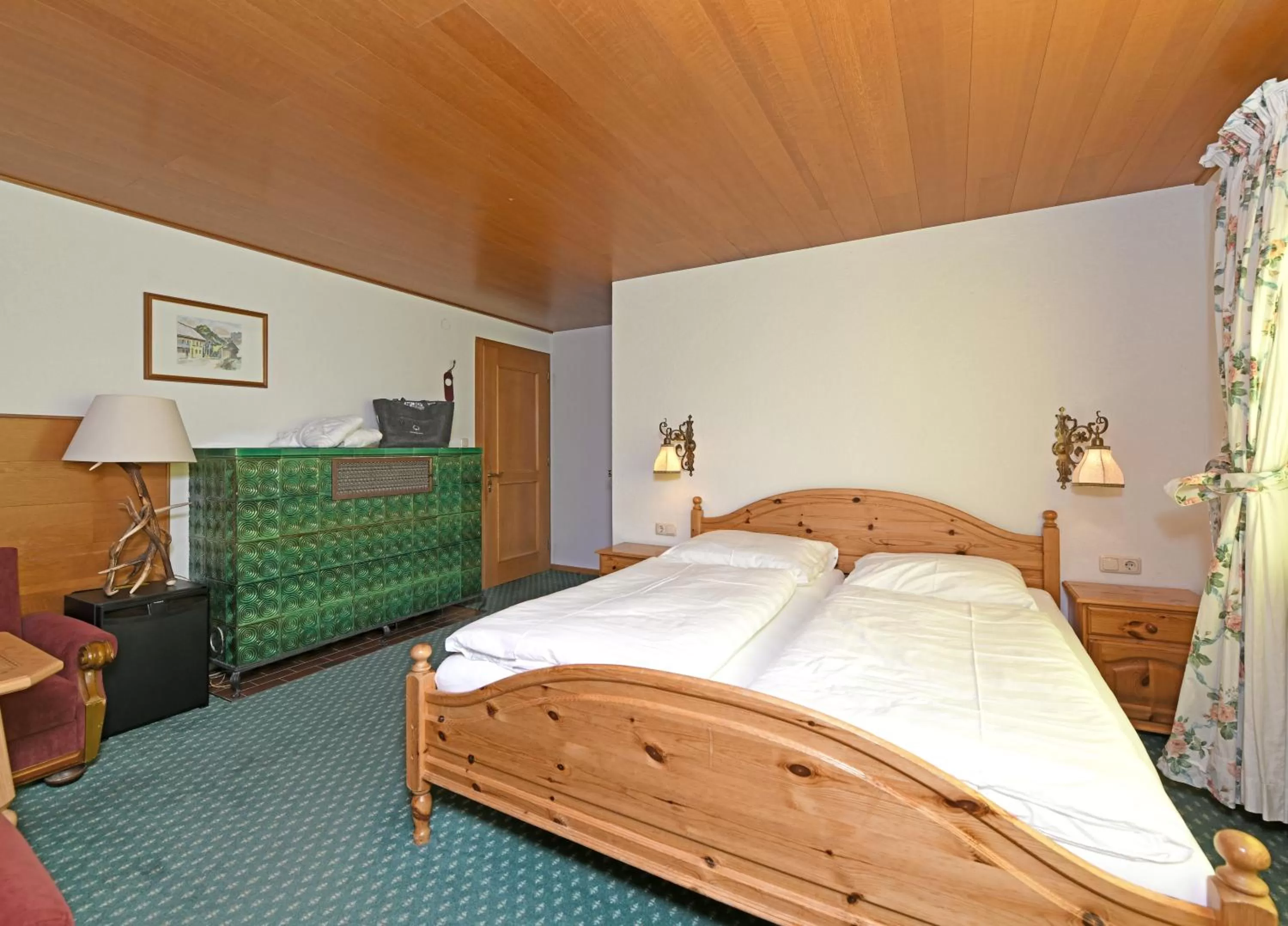Bed in Hotel St Hubertus